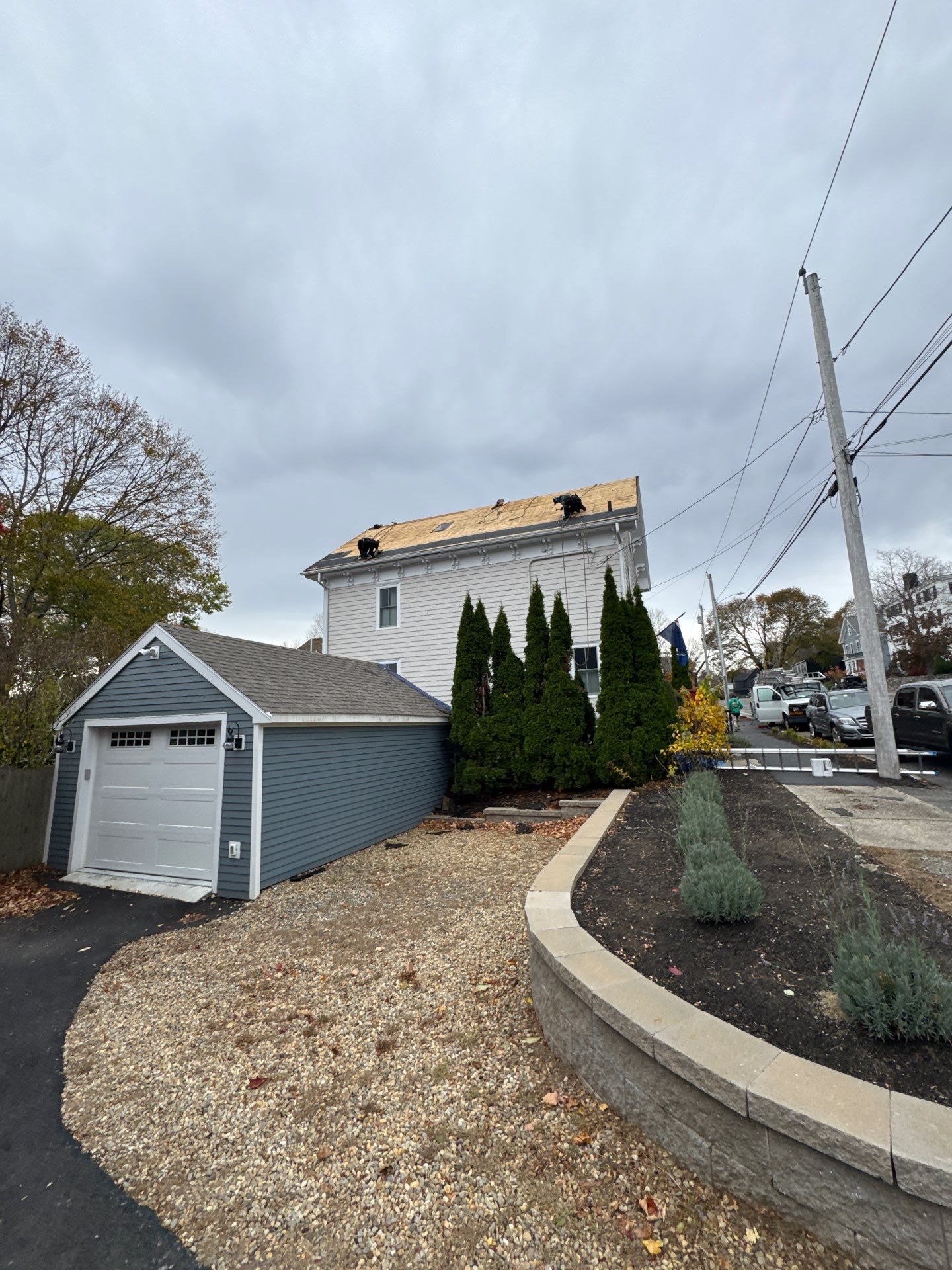 Newburyport Complete Roof Replacement with Solar Venting Skylight by Mighty Dog Roofing of Greater Middlesex County