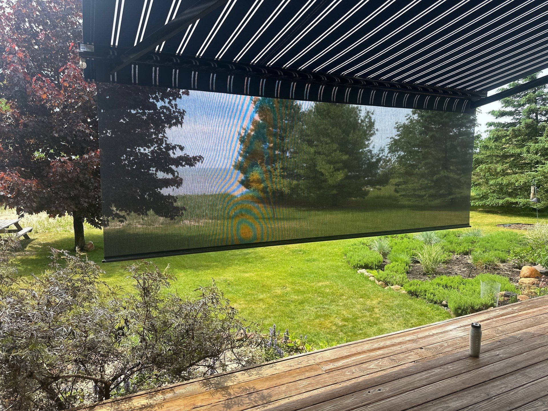 Sunesta Retractable Awning and Privacy Shade Installation in Ellsworth by Rainbow Seamless Systems