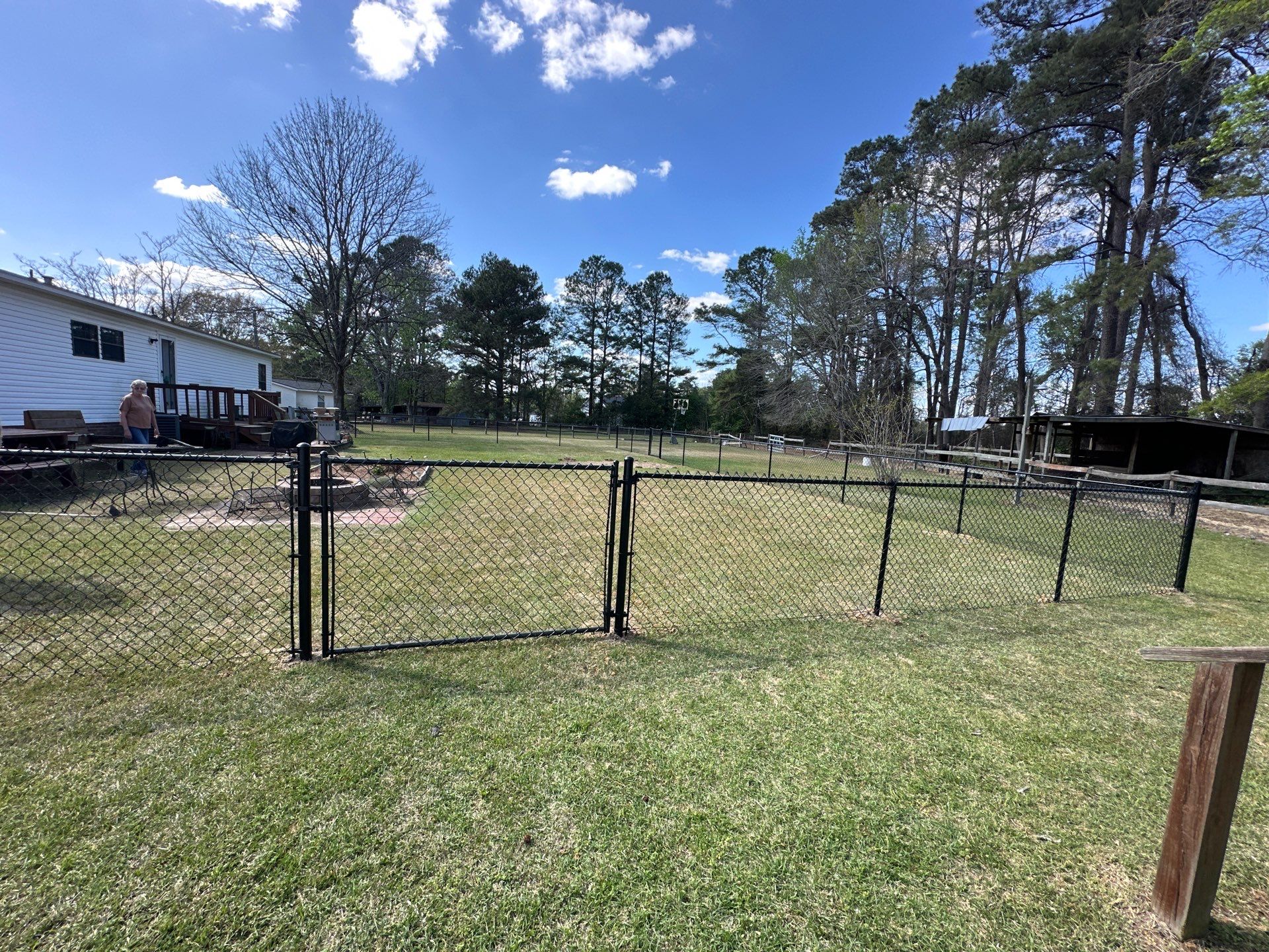 4'H Black Chain Link Fence in Lumberton NC by Superior Fence and Rail