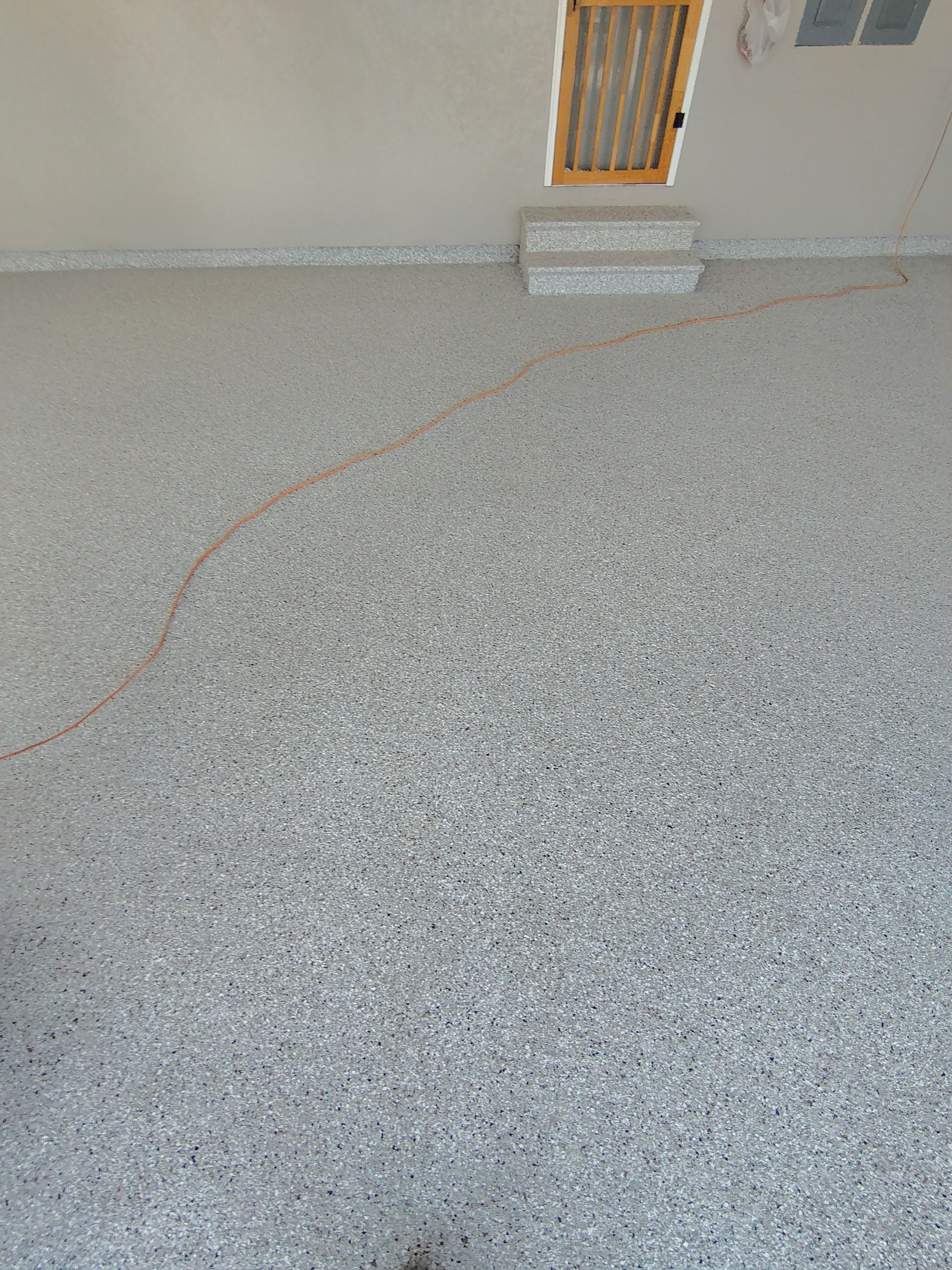 Garage Concrete Floor Coating and Crack Repair in Onawa by Select Painting, Coatings & Garage Cabinets