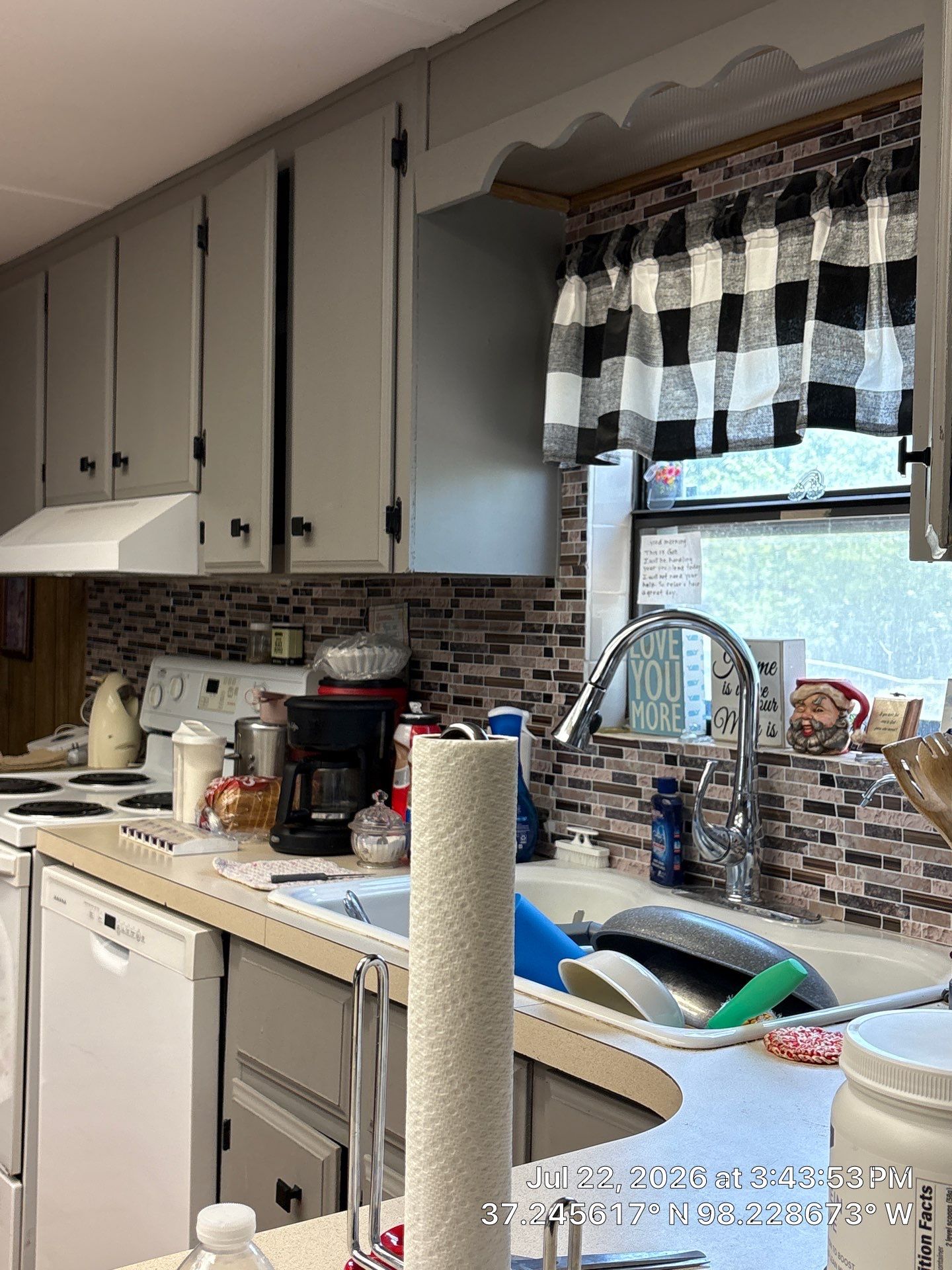 Kitchen Renovation with Gray Cabinetry and Tile Backsplash in Attica by CompanyCam Sales Demo