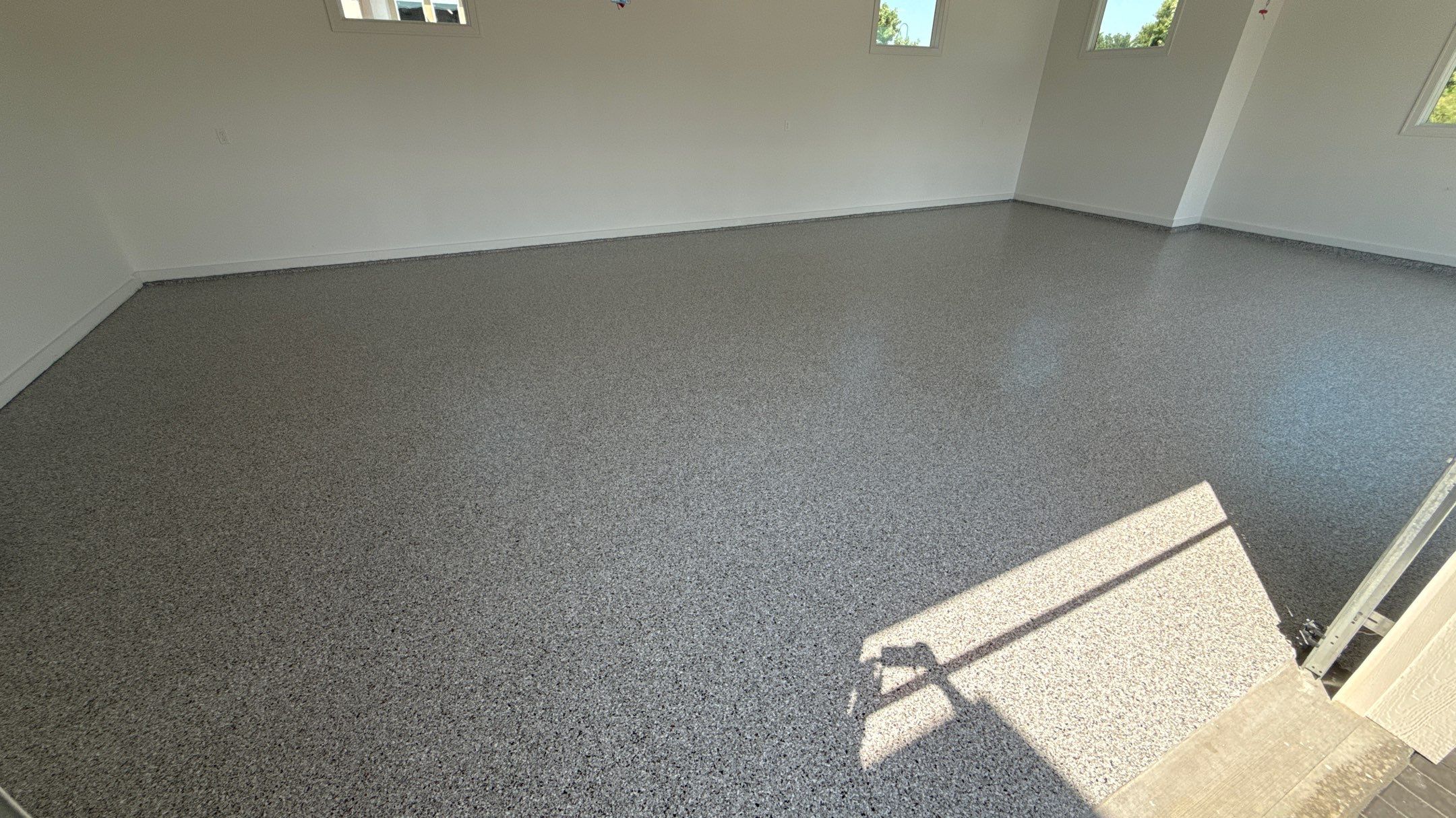 Custom Garage Epoxy Flake Floor Coating in Leawood by Banner Garage