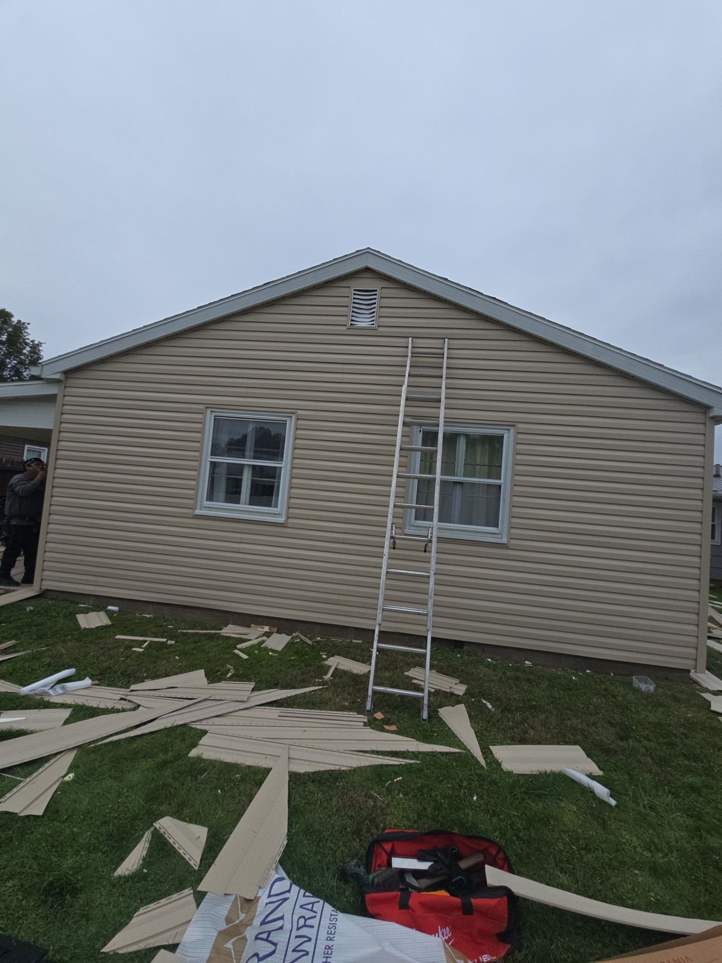 Siding Installation using Vinyl Siding by Rainstoppers Roofing
