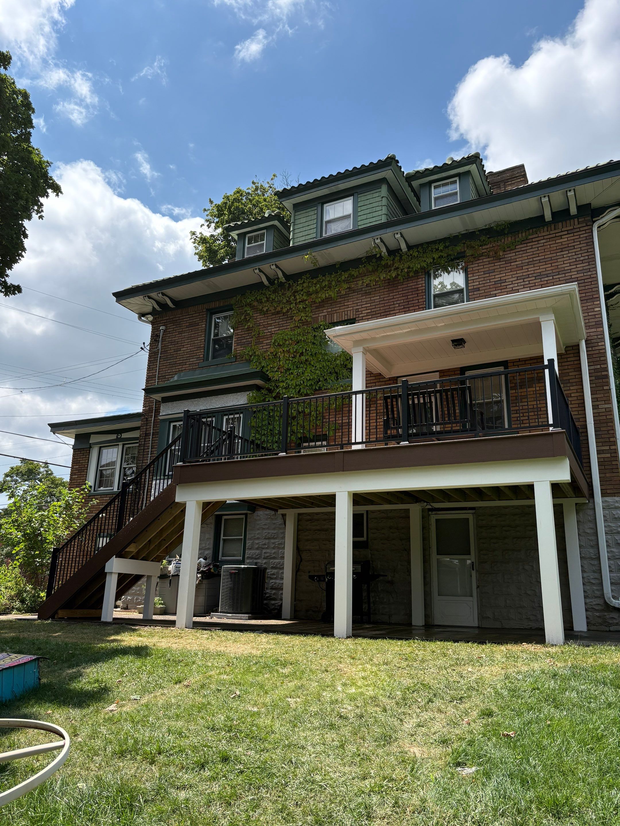 Deck and Roof build  by Cousins Roofing Siding & Decks