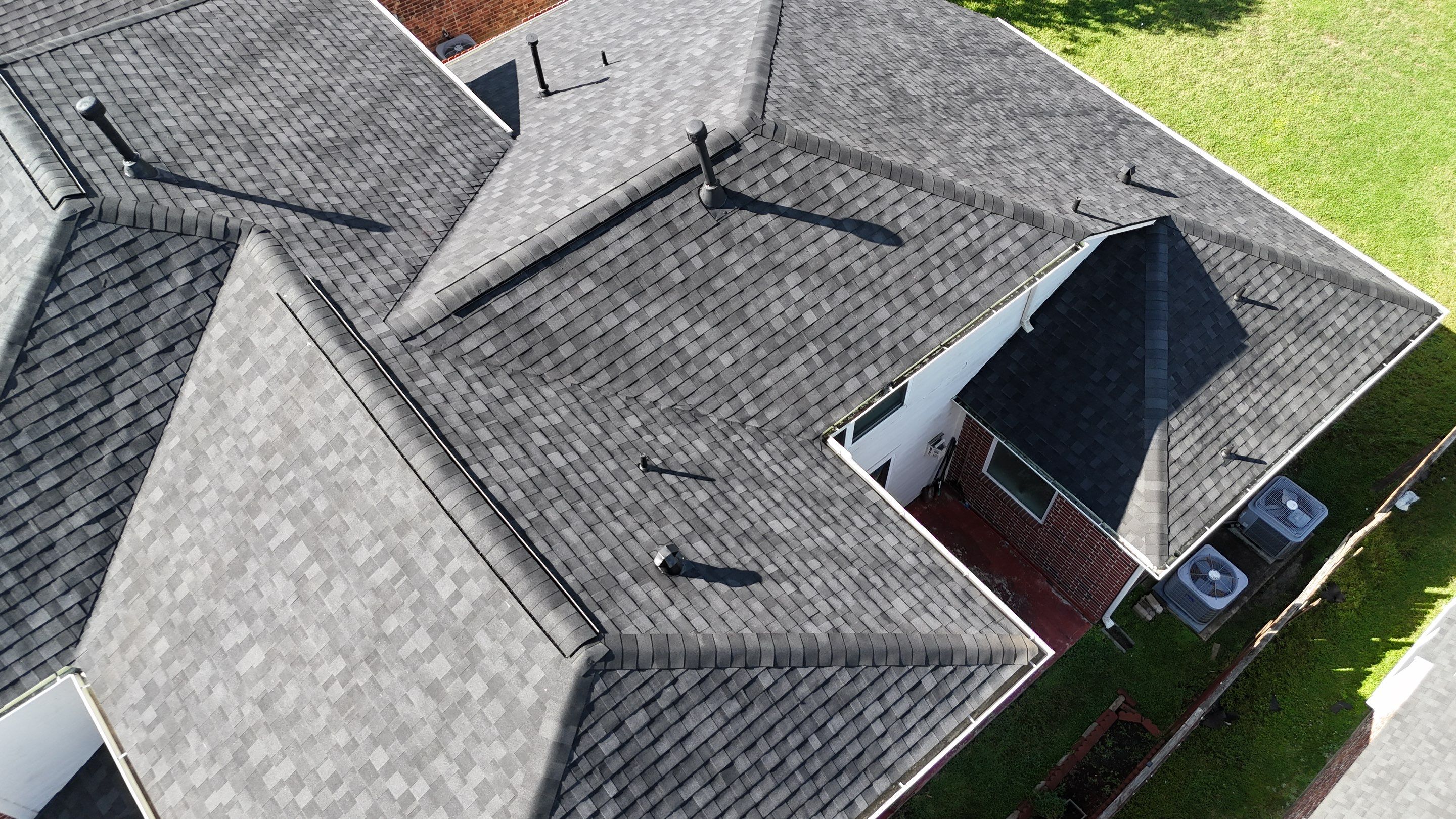 Residential Roofing Installation using IKO Dynasty by Core Four Roofing