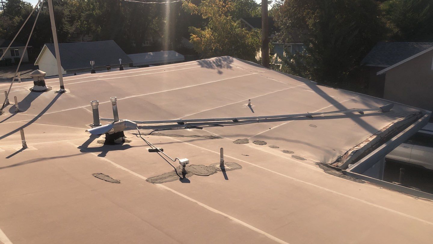 Spray foam and coatings using Conklin Benchmark/PUMA XL coatings and spray foam by Straight Edge Roofing Inc