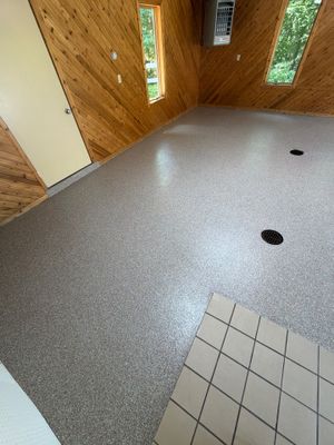 Grand Haven Garage Epoxy Floor Coating with Wax Wing Flake