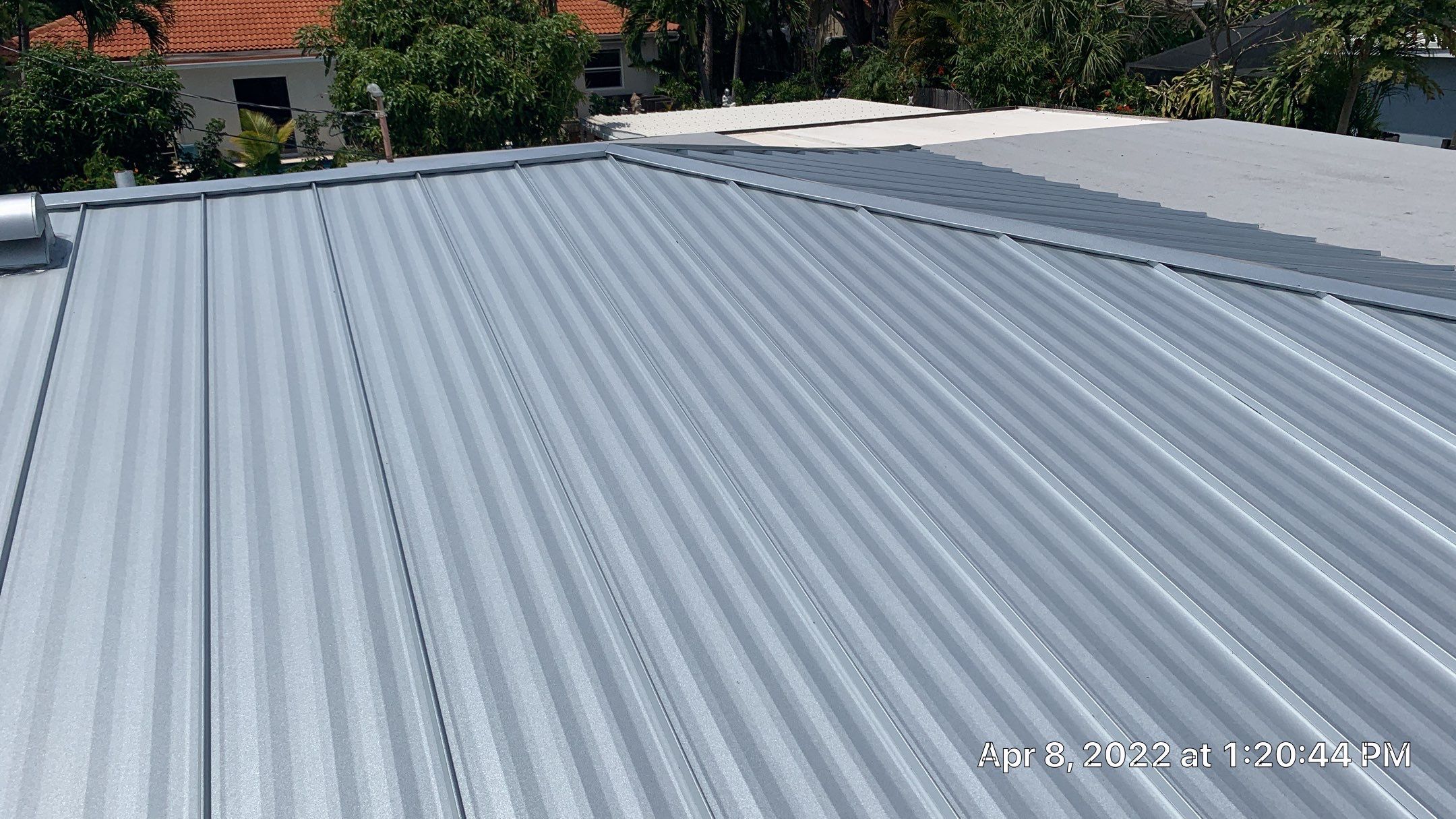 Residential Roofing Installation using 1" Nail strip metal roof by BLUES BROTHERS CONSTRUCTION CORP
