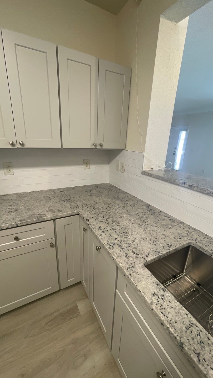 Home Remodel using LVP Flooring and Cabinets by HandyMangum