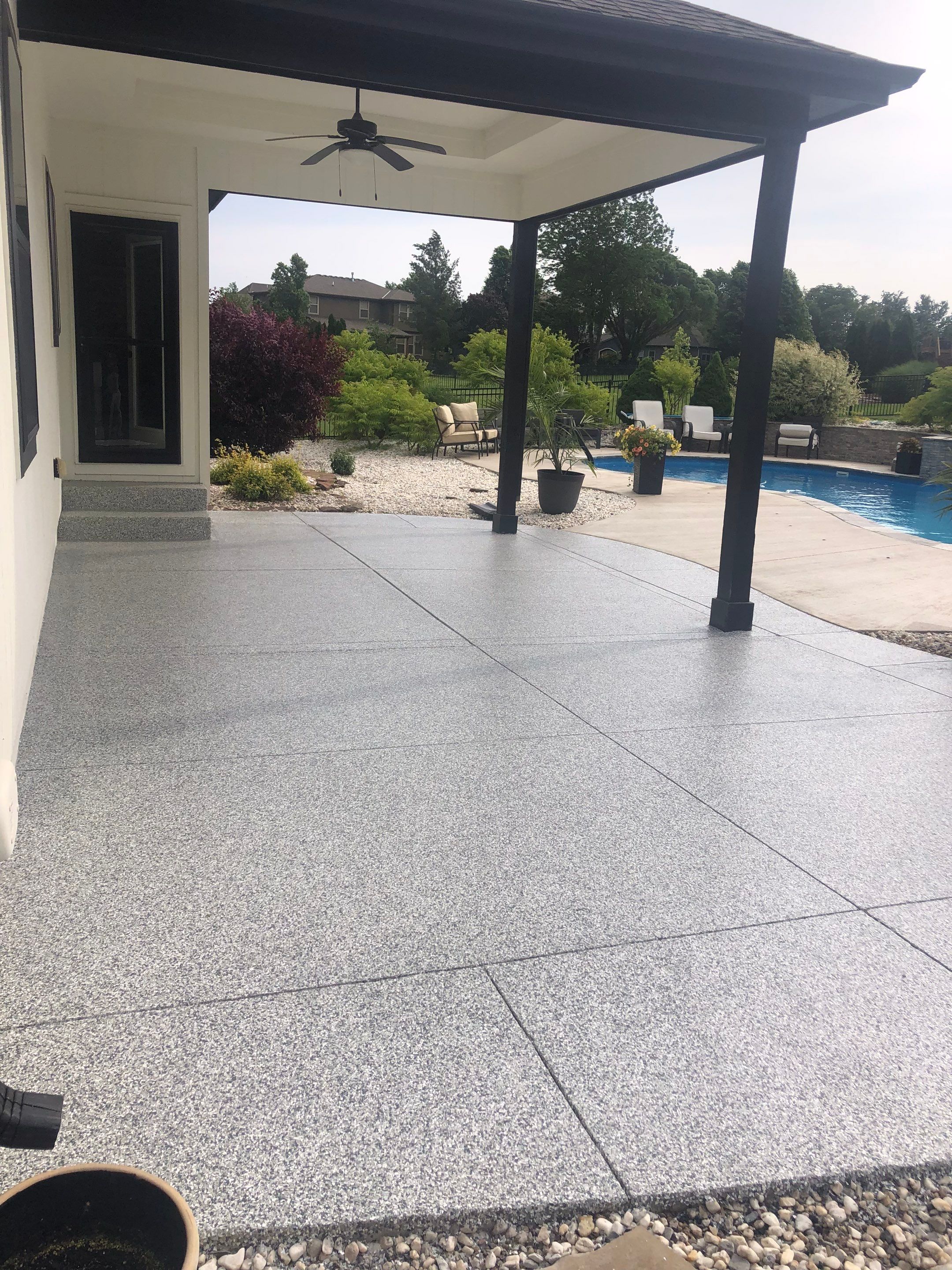 Patio using Slate Stone by Select Painting, Coatings & Garage Cabinets