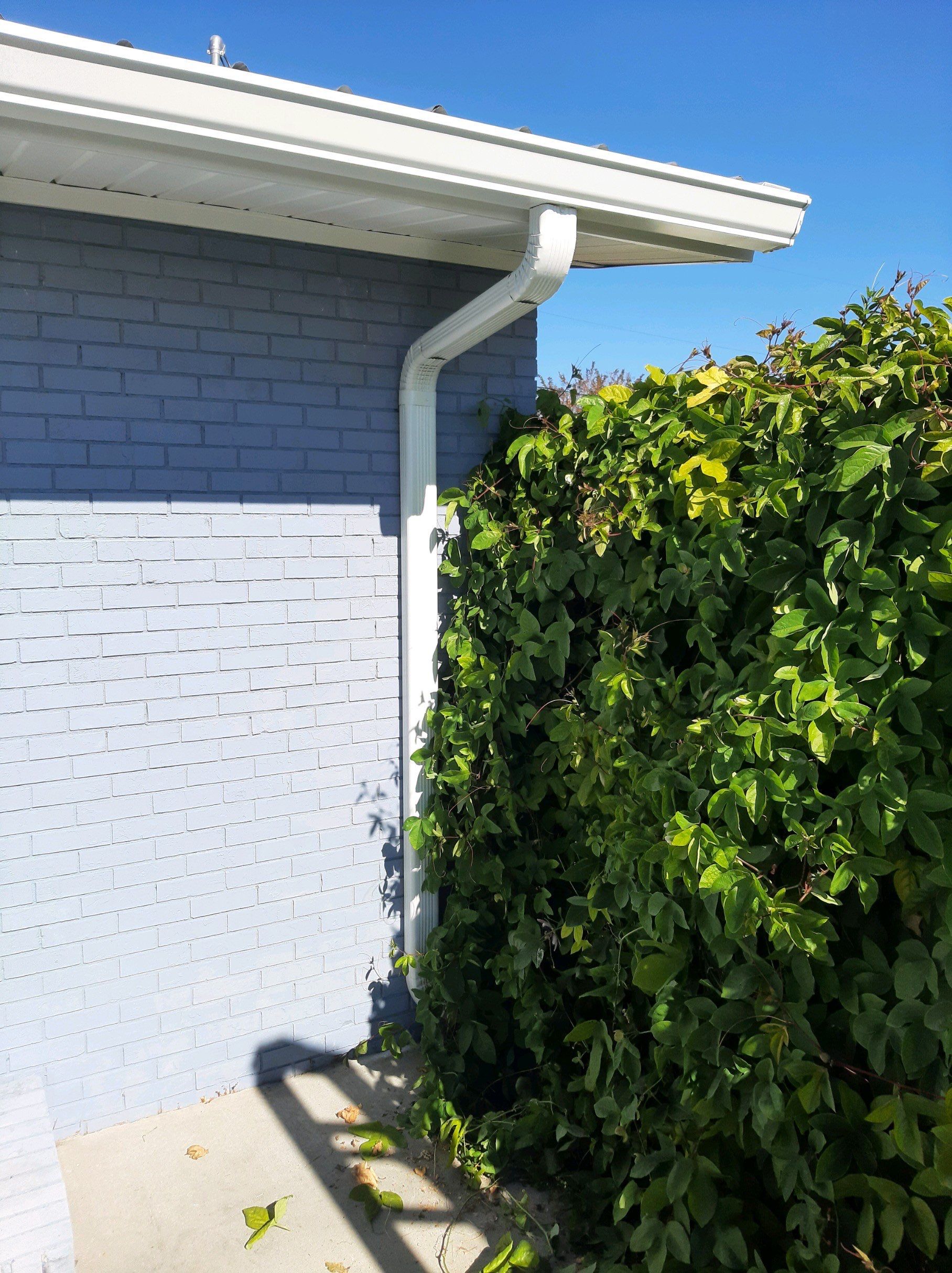Gutter Installation using K-Style Seamless Gutters and Soffit and Fascia Replacement by Gutter Professors
