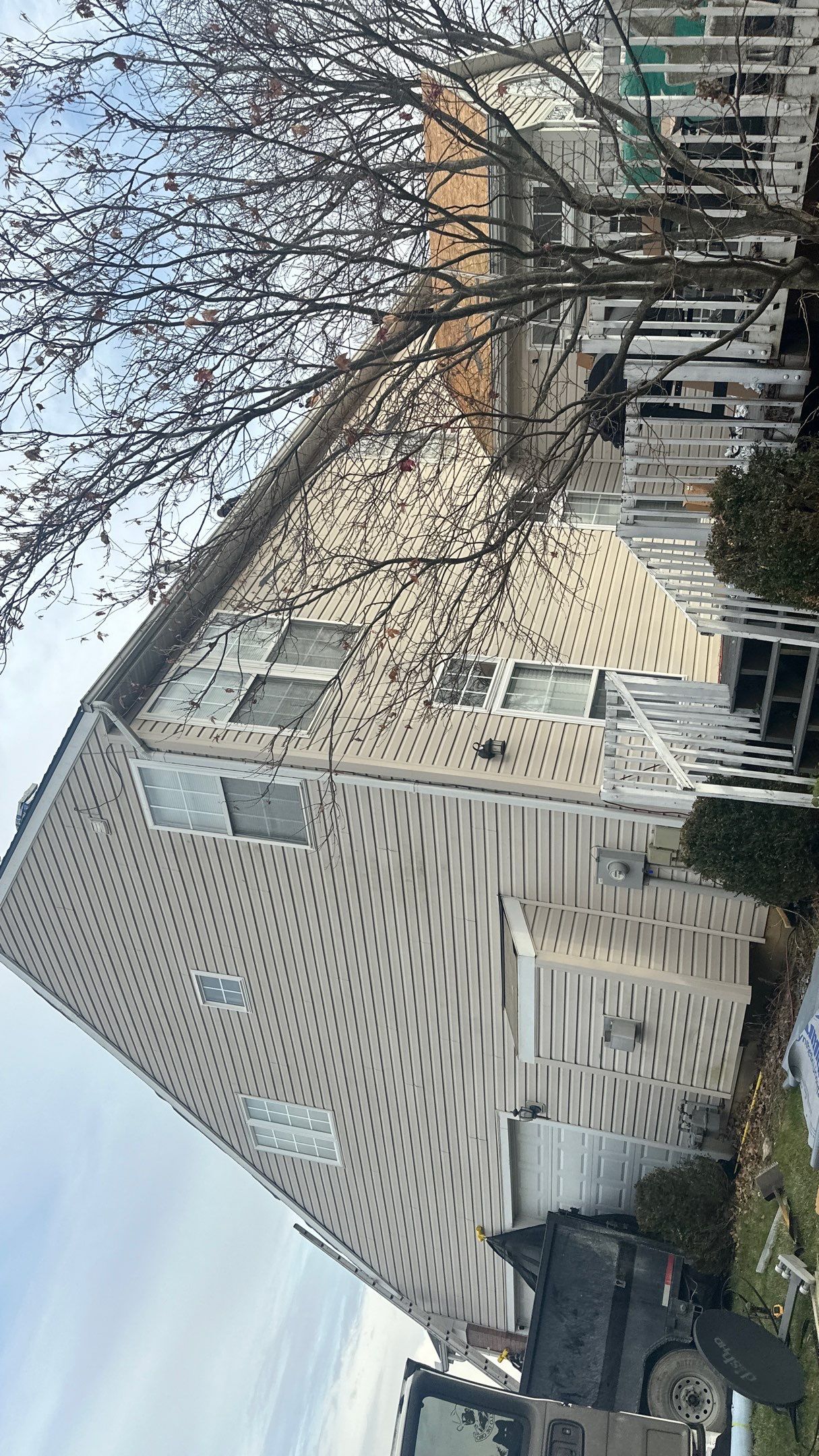 Walden Ponds - Pristine Black and Hydro Flo Gutter Guards by Tamlin Roofing