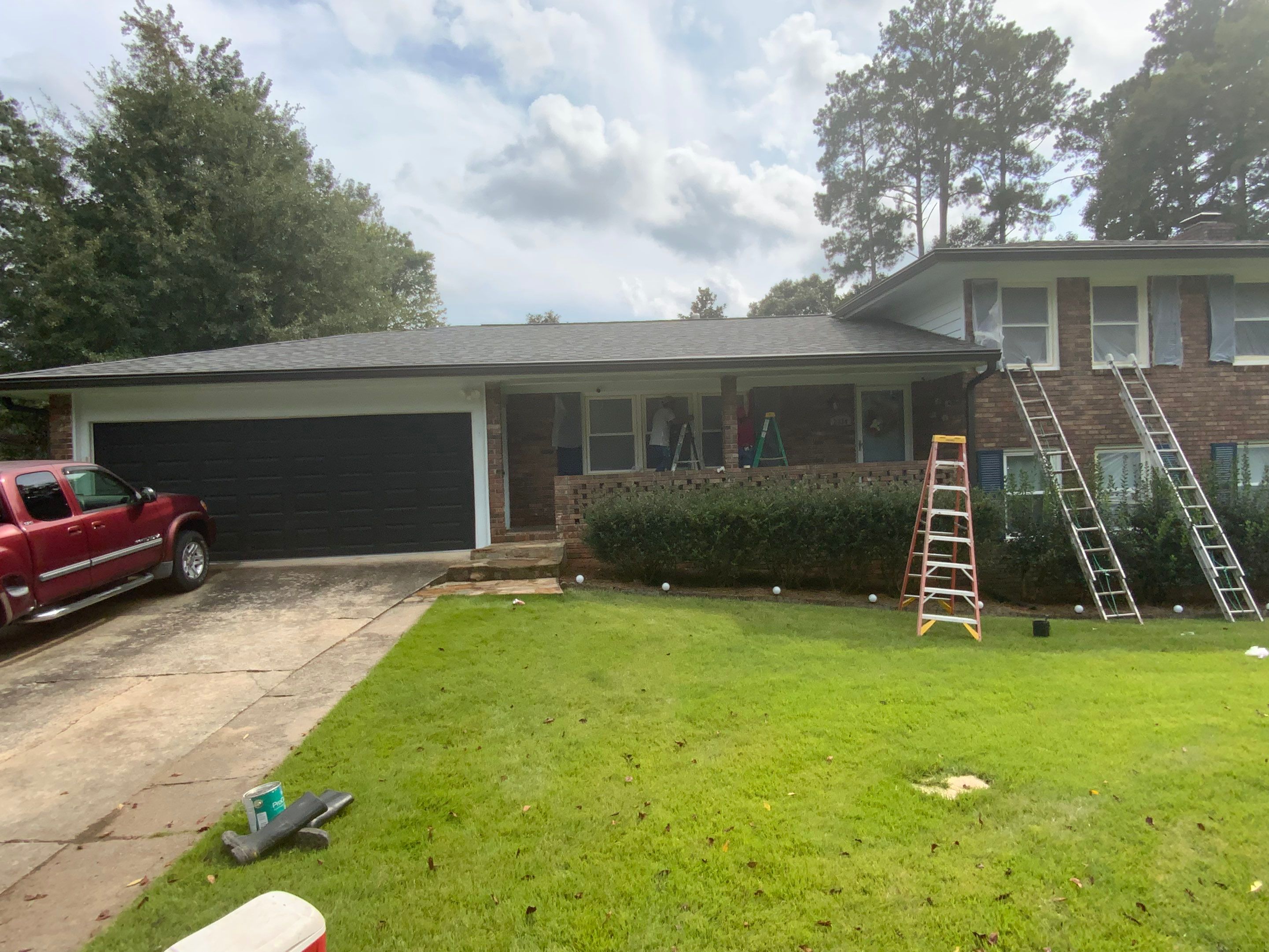 Full Exterior Trim Painting and Multi-Level Deck Staining by Swift Home Renovations