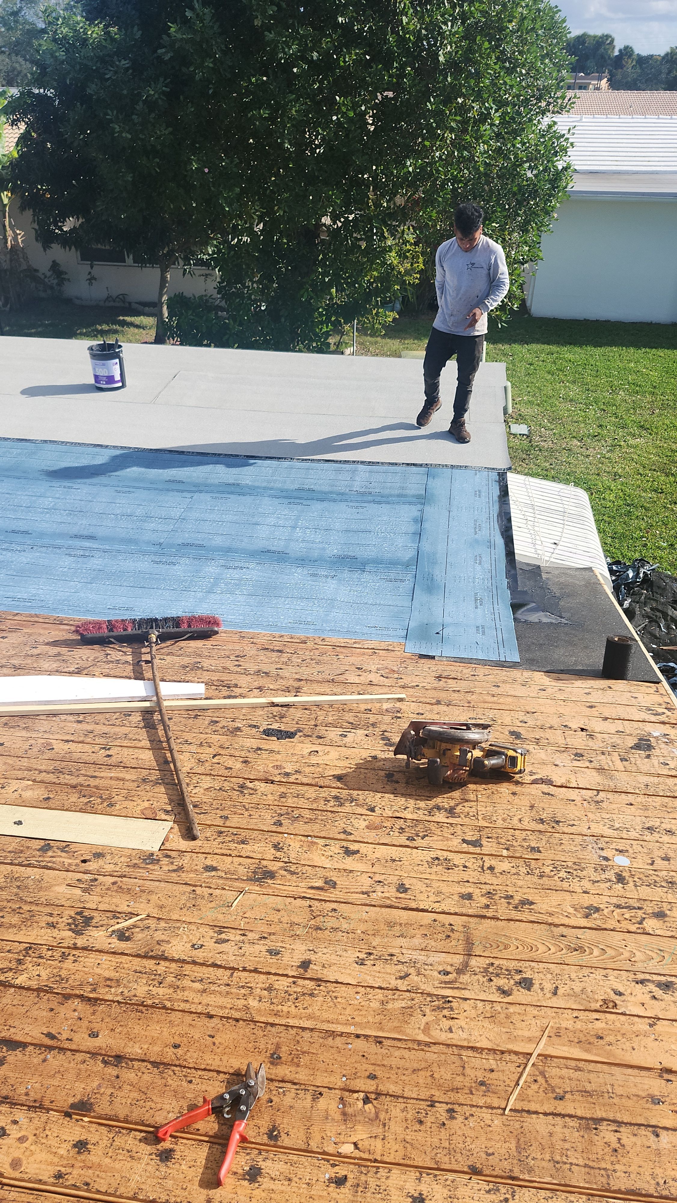 Silicone install-- Flat roof by Aastro Roofing