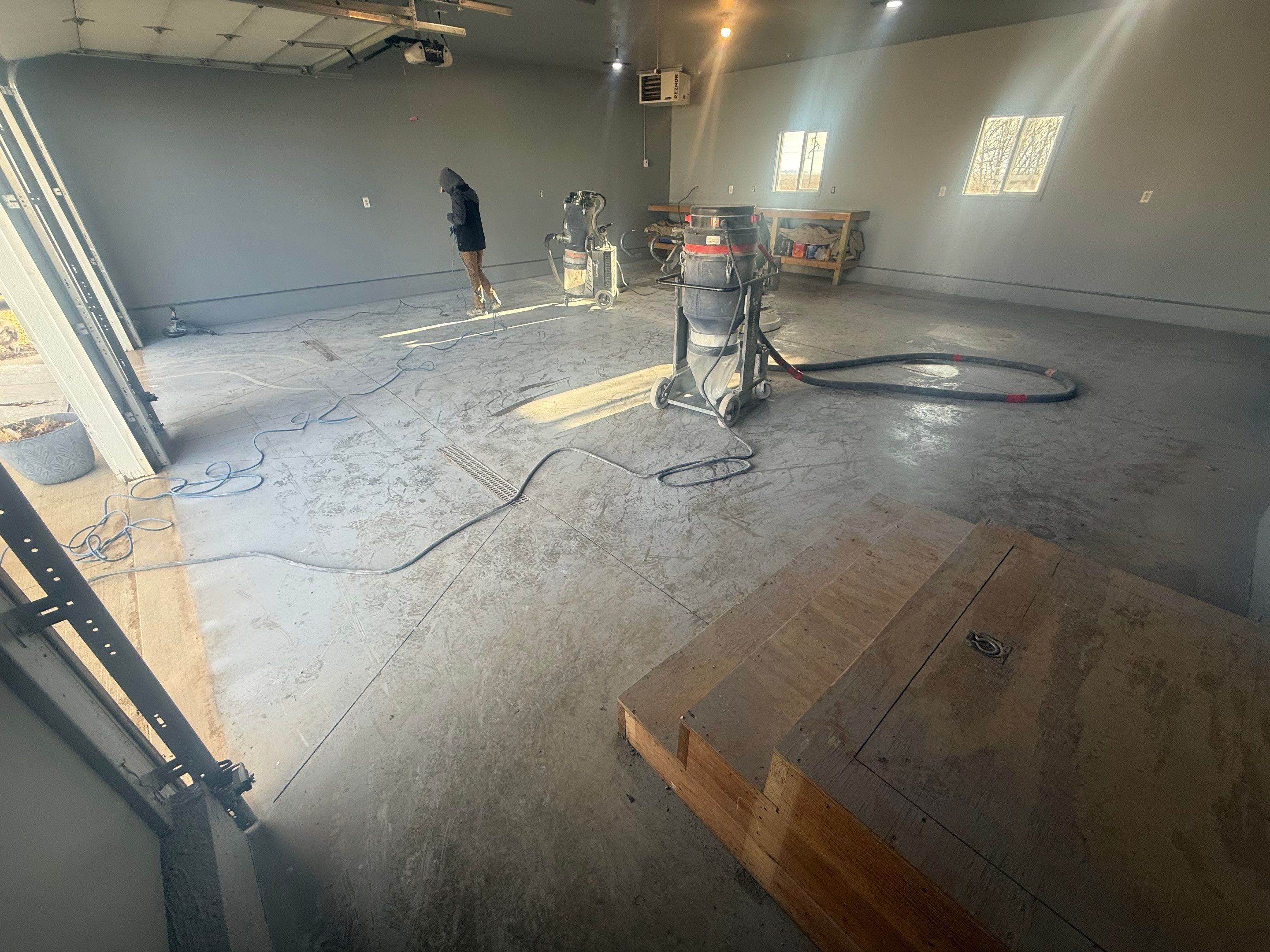 Grey Granite-Style Garage Floor Coating and Stairs in Hartford by Select Painting, Coatings & Garage Cabinets