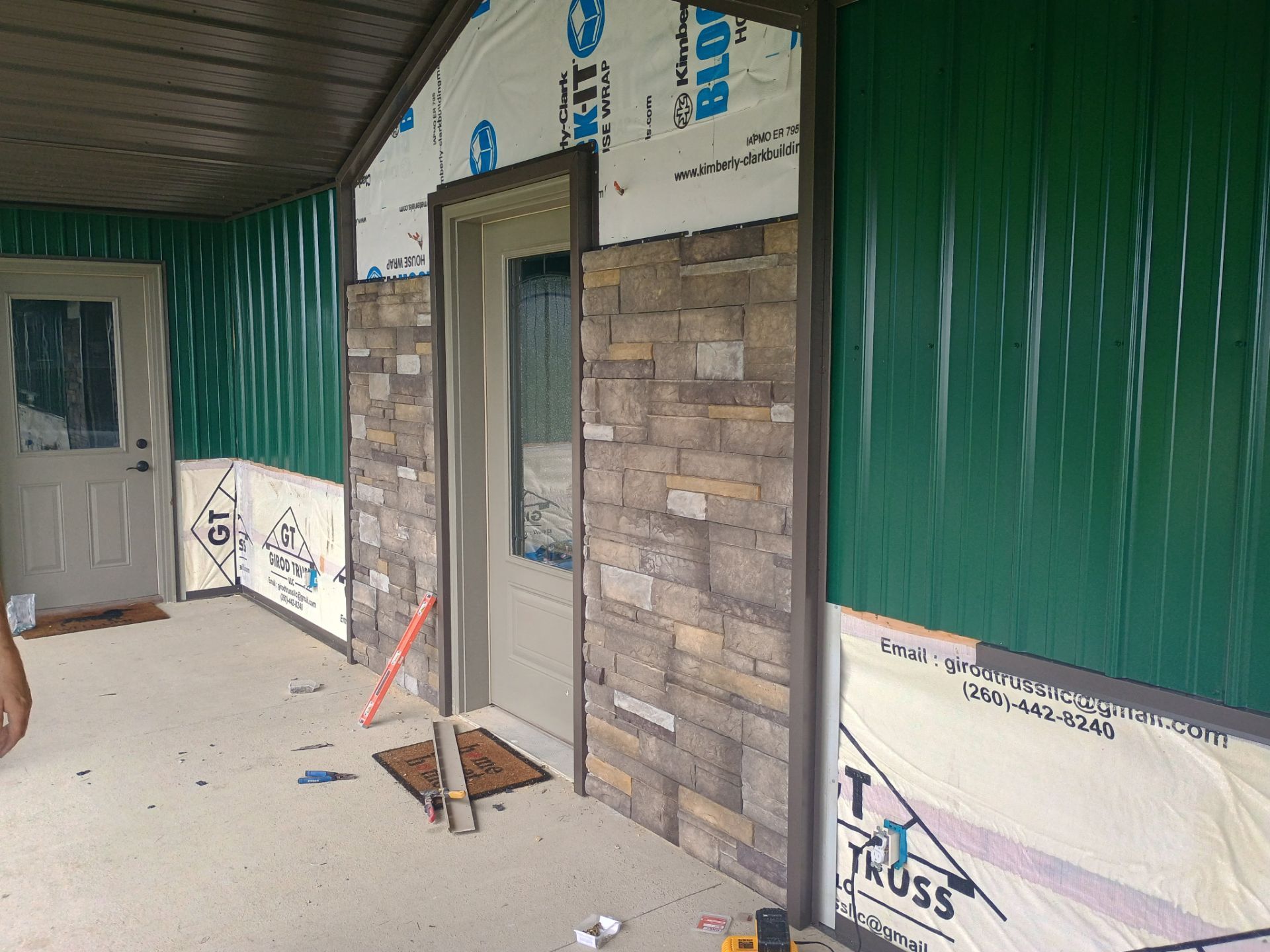 Siding Installation using Platinum AG Panel Burnished Slate  by Nitro Roofing and Construction