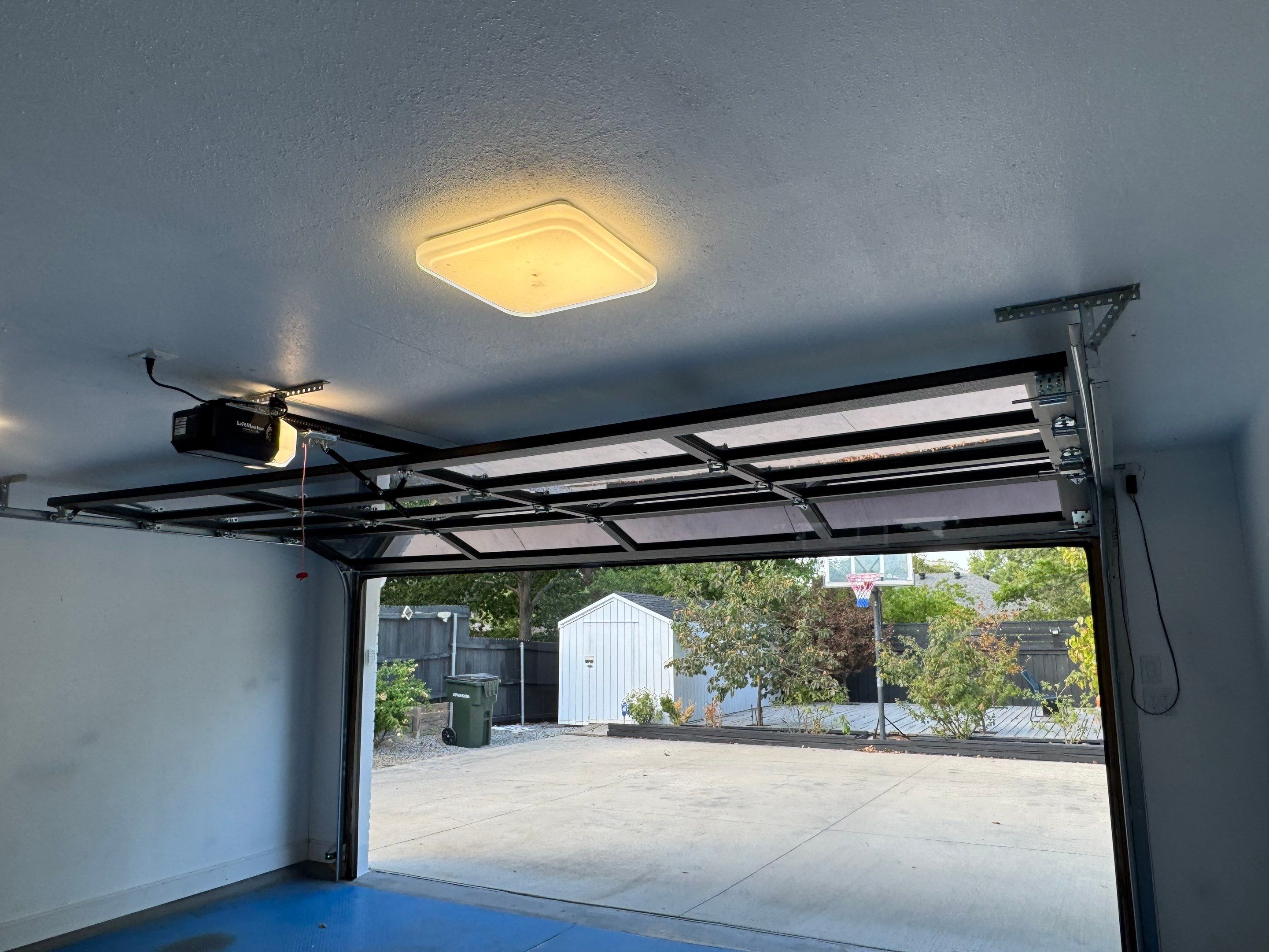 Modern Alumadoor Full View Glass Garage Door Installation in Plano by Meadows Garage Doors
