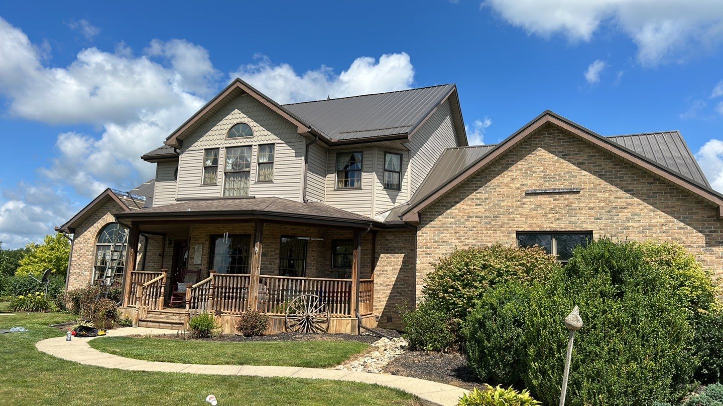 Residential Roofing Installation using Performance Panel Metal - Burnished Slate by RoofX 