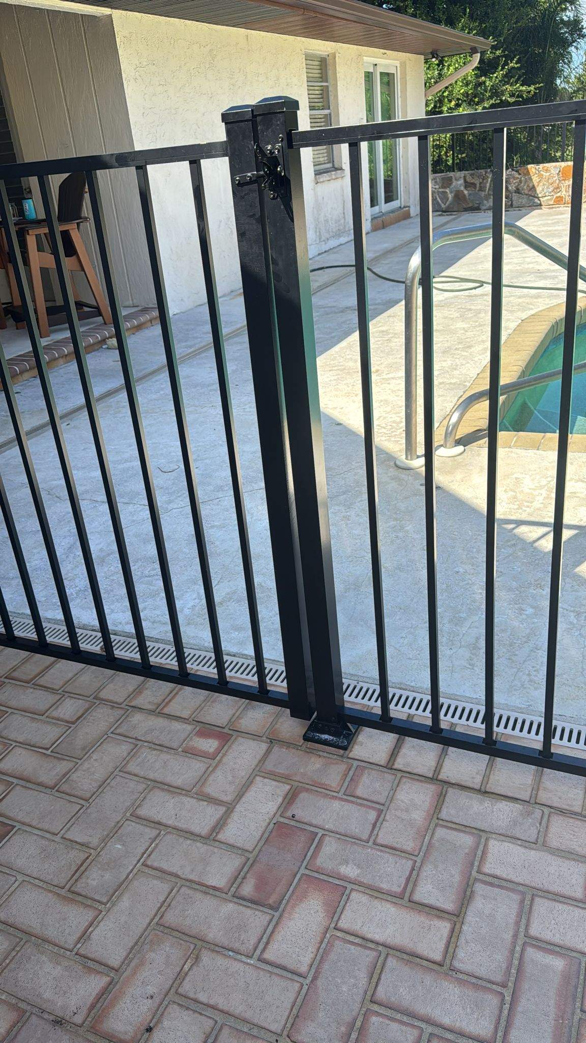 Black Aluminum Pool Safety Fence Installation in Punta Gorda by True Fence LLC