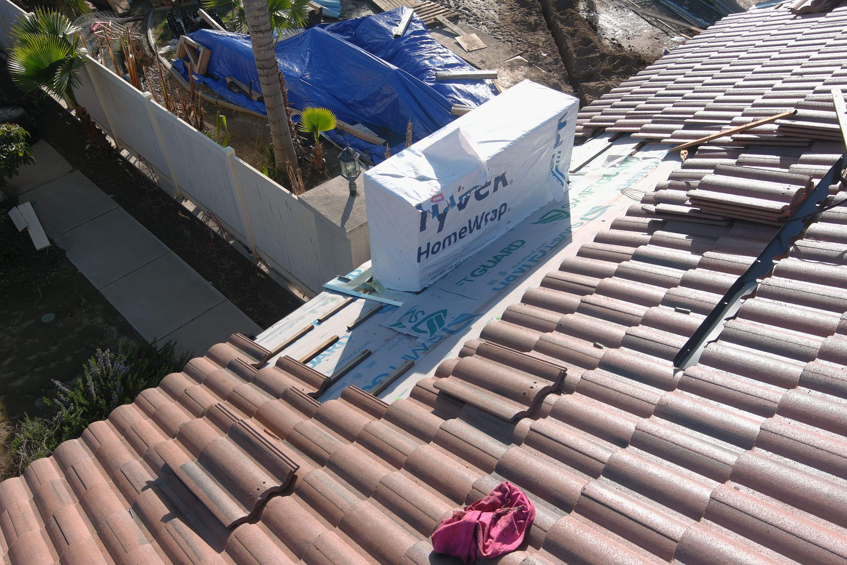 Tile, Metal, and TPO roofing project (new construction) by Straight Edge Roofing Inc