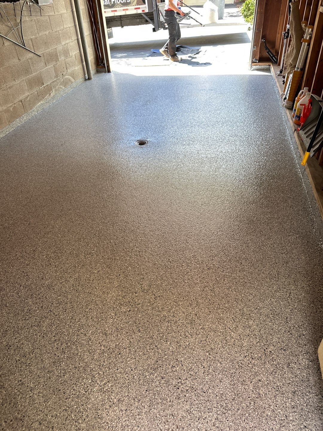 Silverado garage floor coating  by NG Masonry & Construction LLC