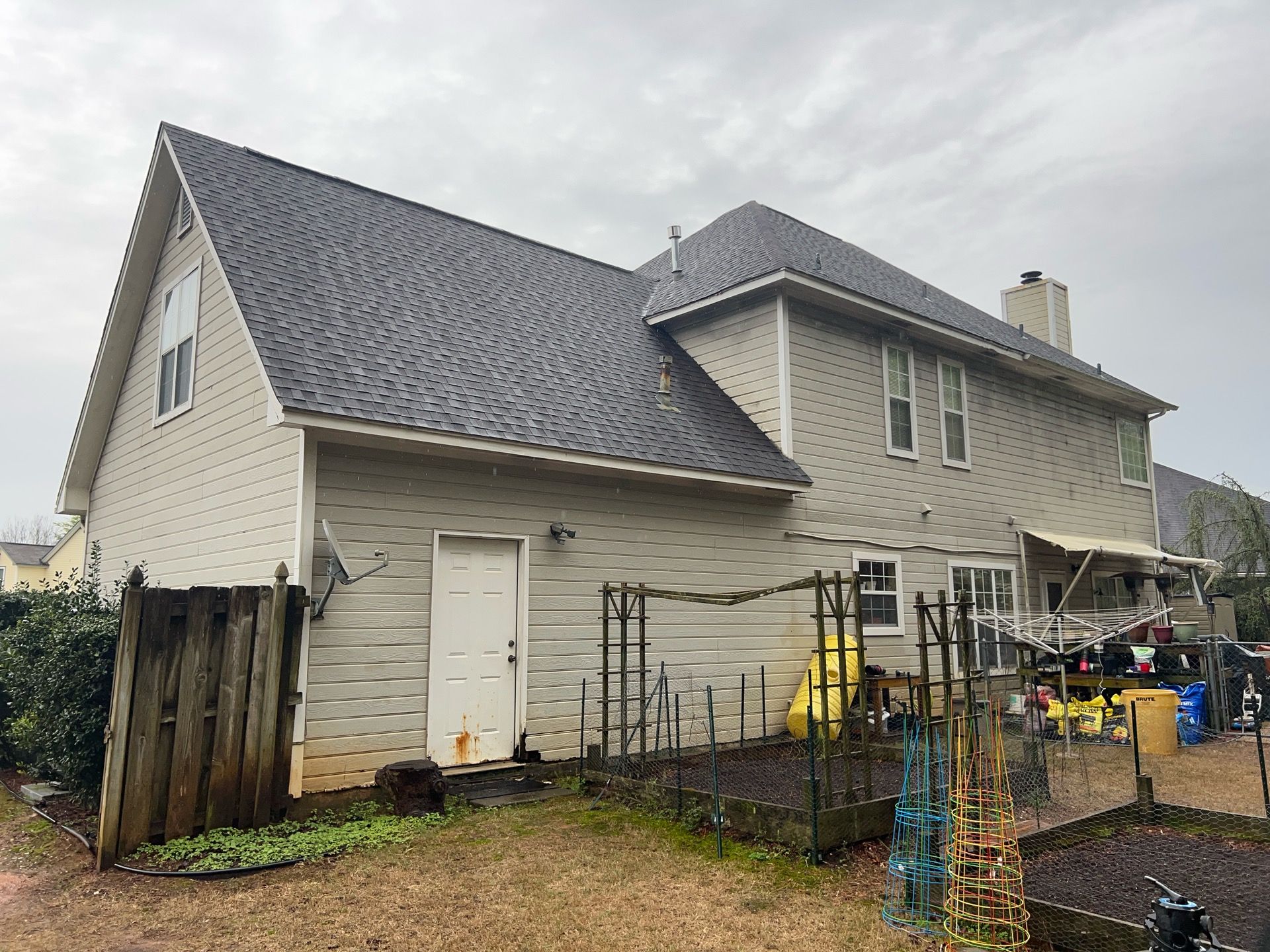Evening Blue Hardie + Windows by Freedom Exteriors