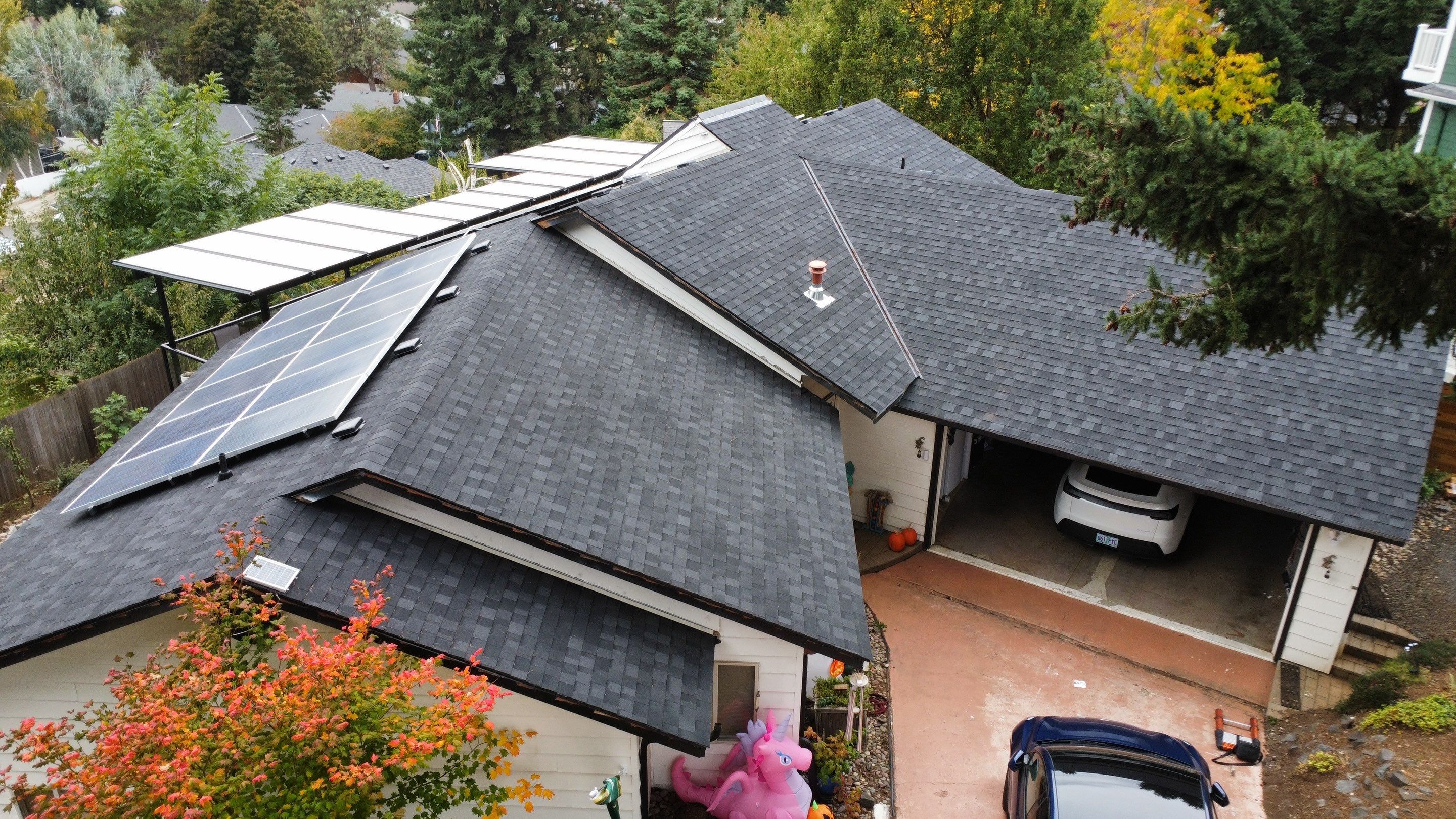 Granite Black Residential Roof Replacement by Orezona Building & Roofing Company, Inc.