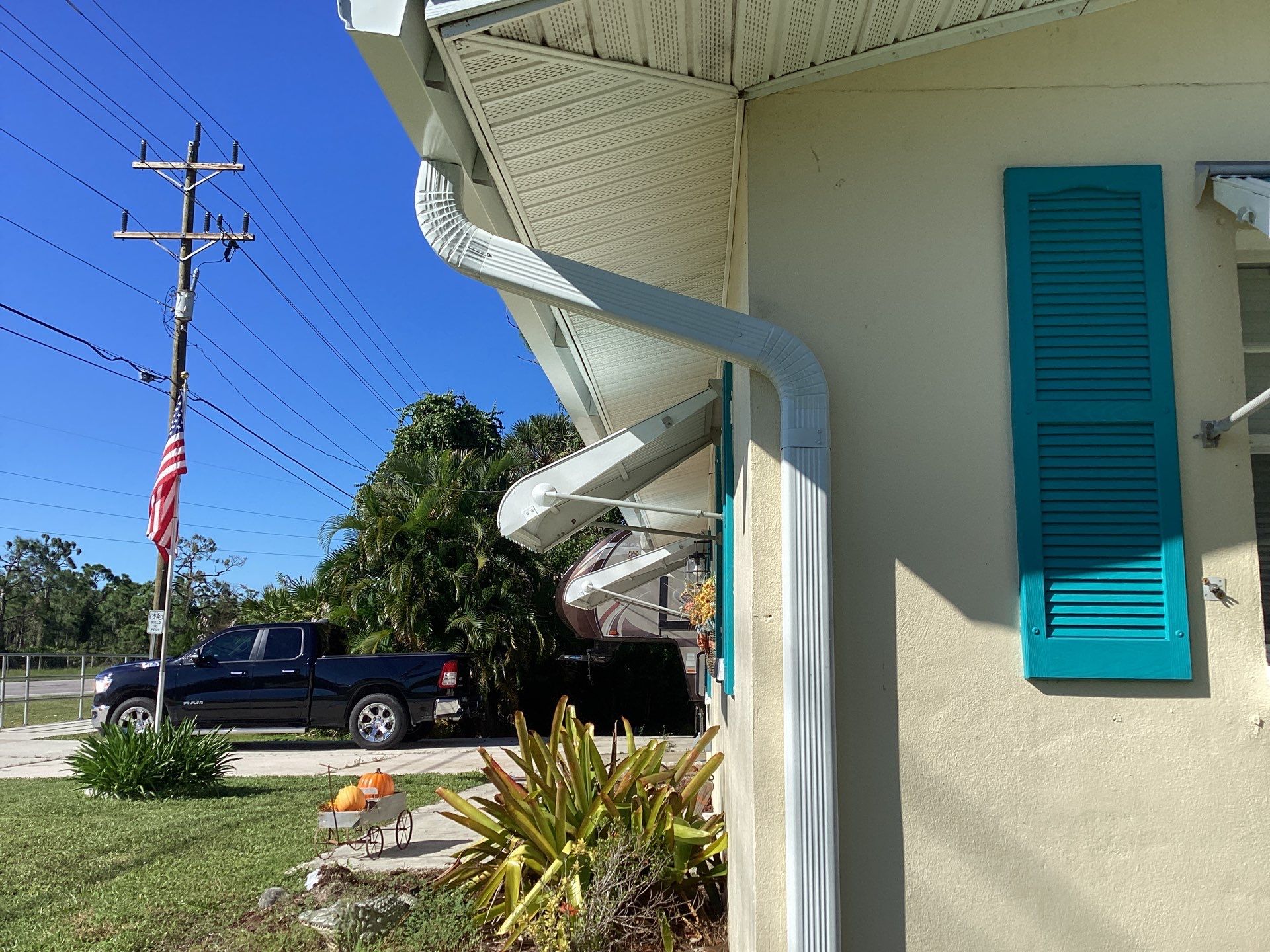 3x4 Downspouts and Seamless Gutters for Coastal Homes in St James City FL by Gutter Professors