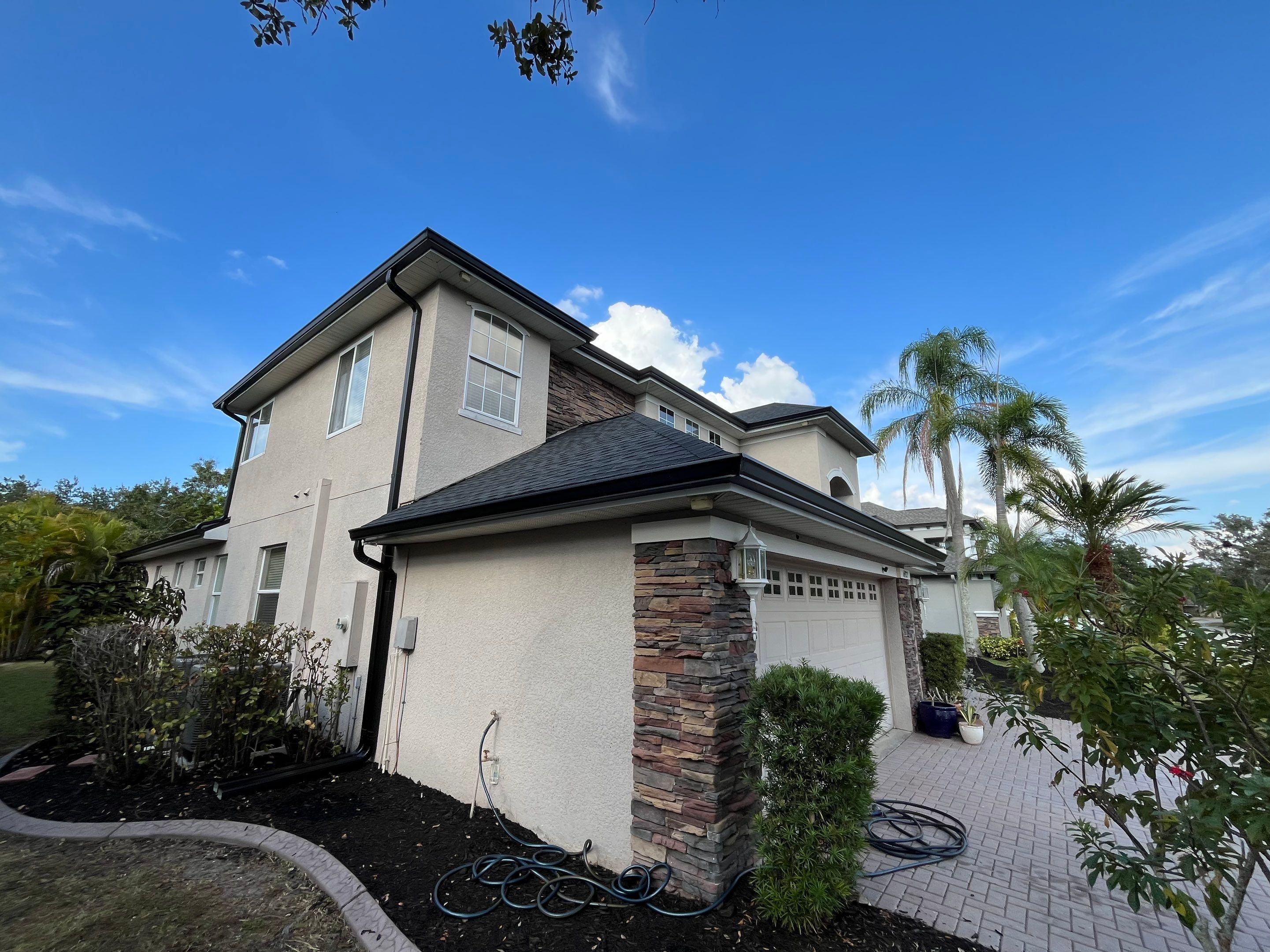 Black 6-inch Seamless Gutters for Modern Ellenton Homes FL by Gutter Professors
