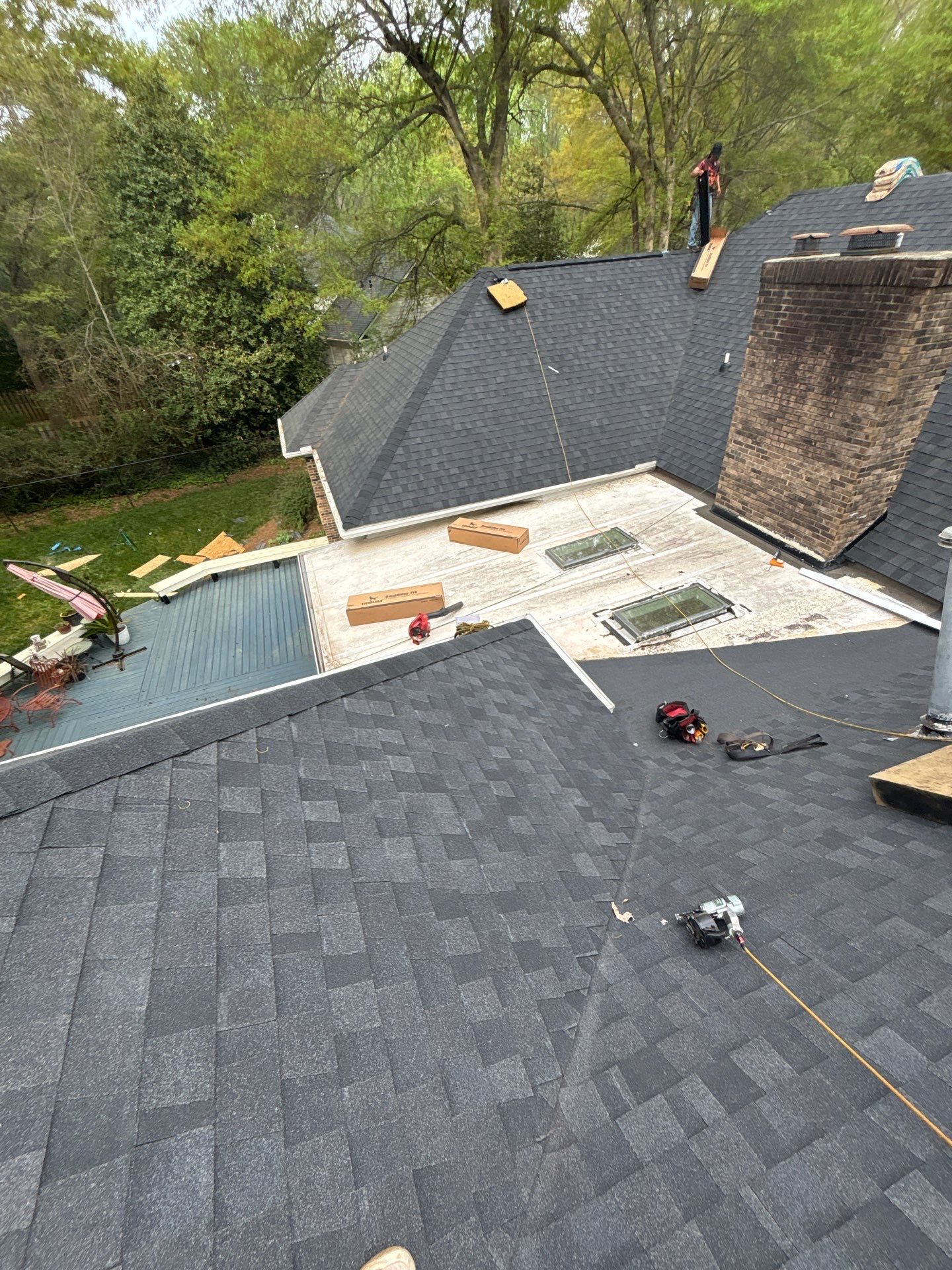 Spartanburg Residential Roof Replacement with Architectural Shingles and Skylights by Roofers LLC