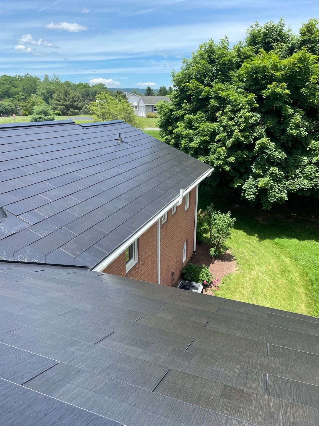 Tesla Solar Roof Installation by American Home Contractors