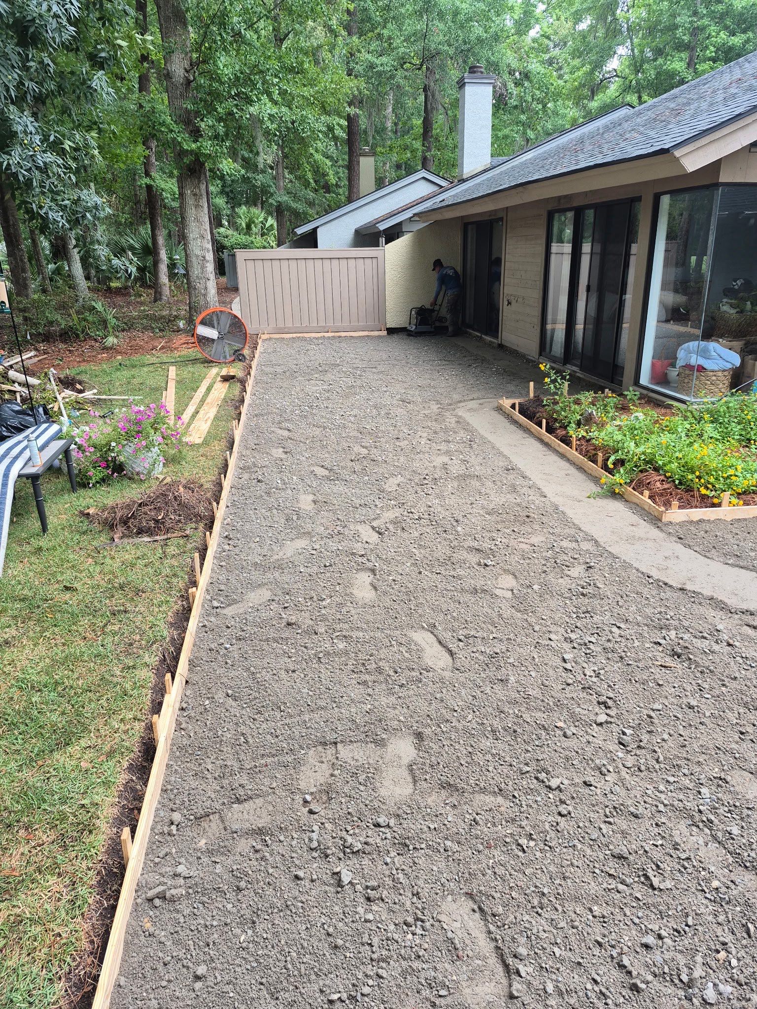 Custom Concrete Patio and Herringbone Paver Walkway in Hilton Head Island by Lowcountry Scapes, LLC