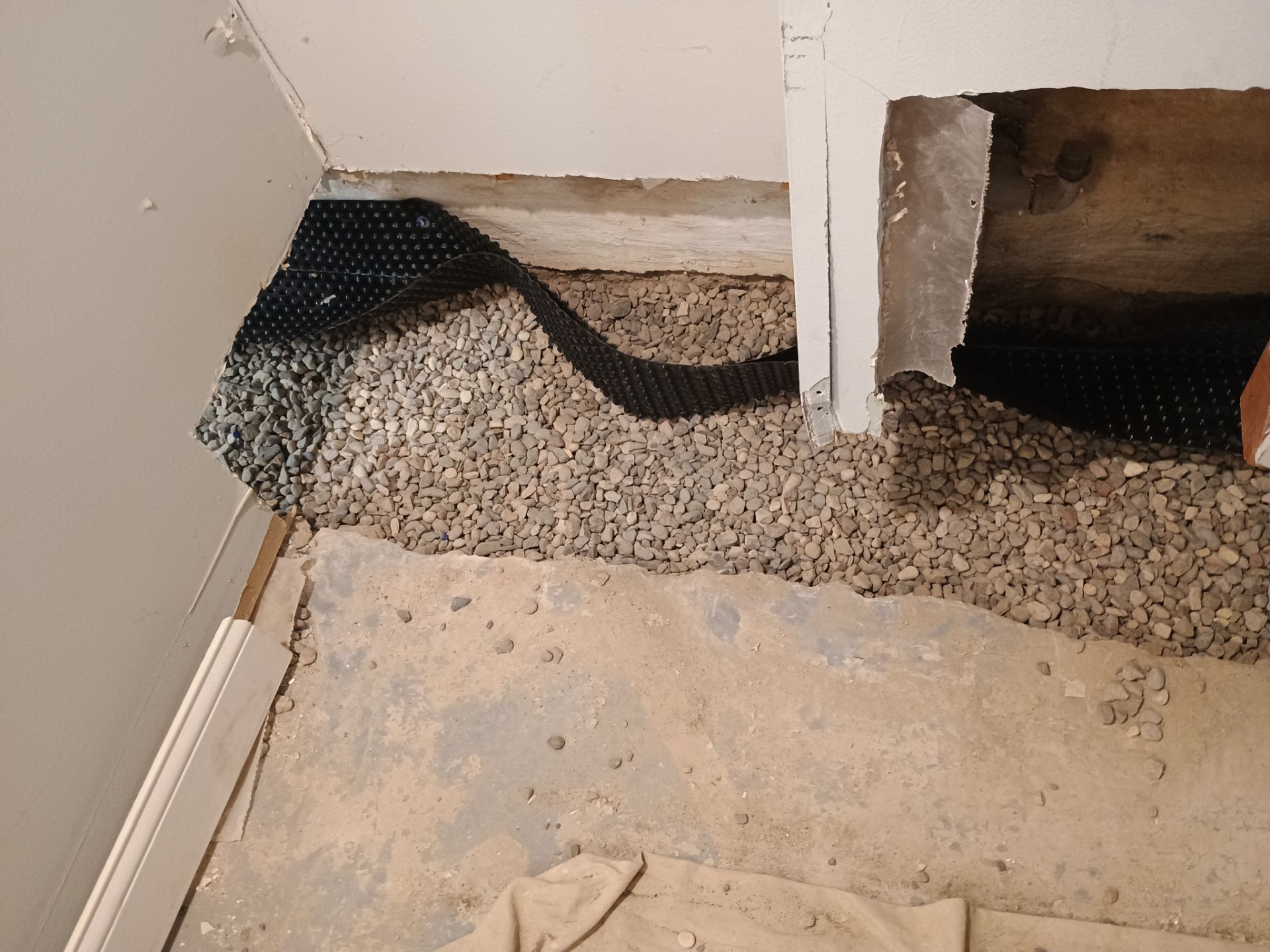 Interior Drain Tile Installation in South Minneapolis by Waterproofing Northeast