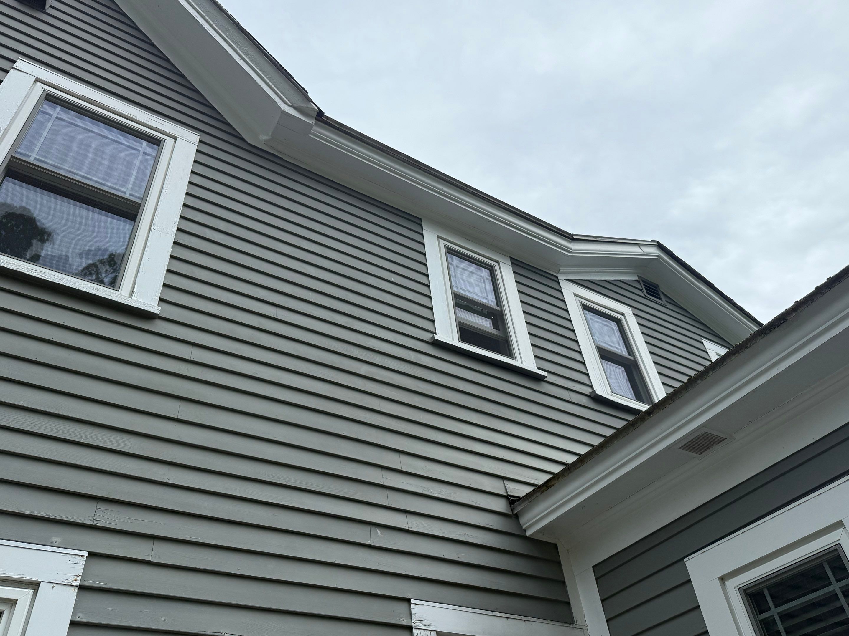 Full Roof Replacement + Custom Gutter Install | Onyx Black Finish by Mighty Dog Roofing of Greater Middlesex County