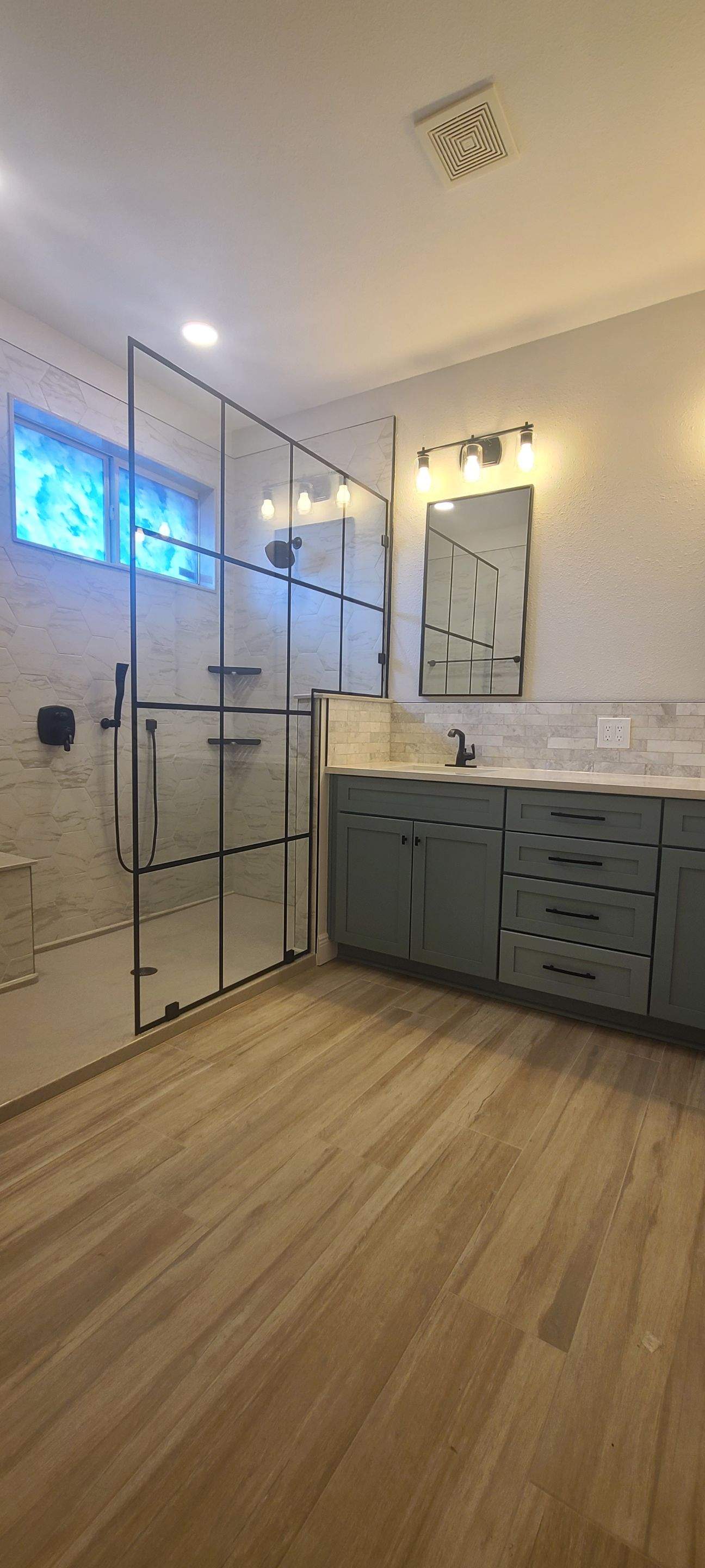 Stone Oak Bathroom Remodel with Paned Shower Glass by Legacy Bath and Kitchen