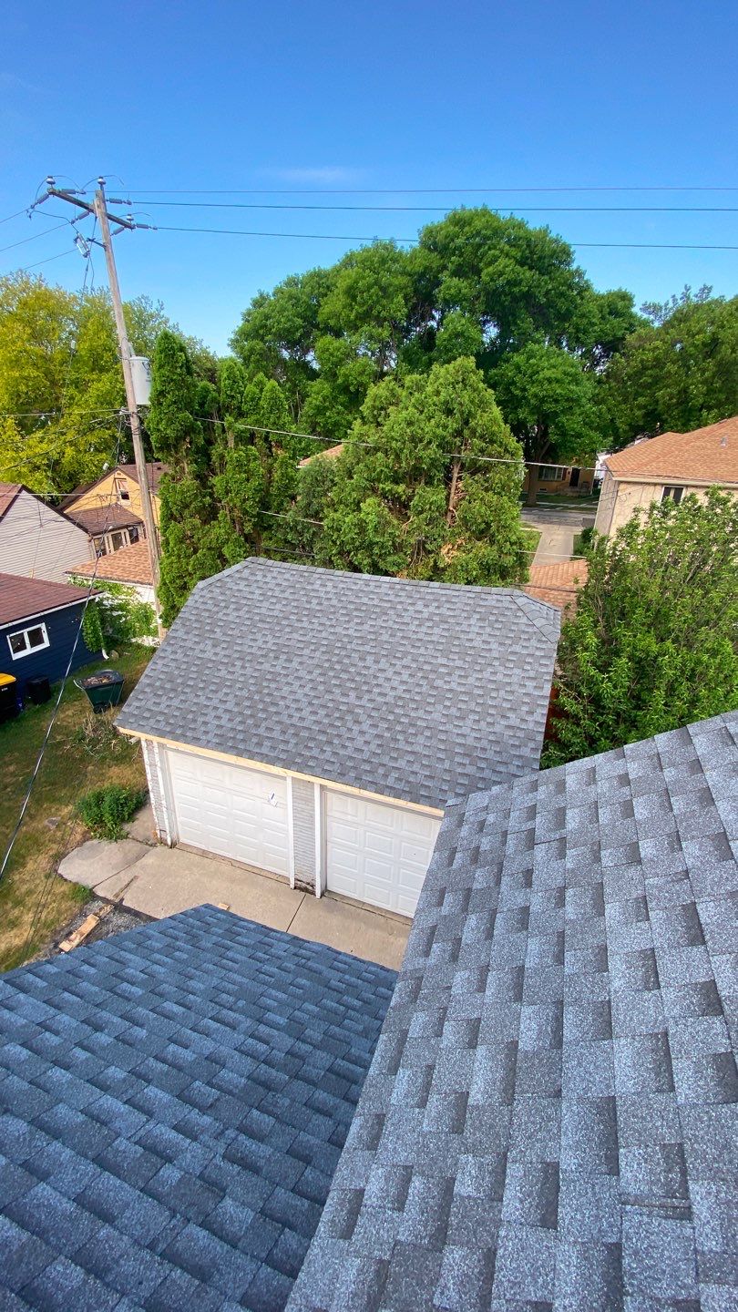 Asphalt Roof, Vinyl Siding, and Aluminum Gutter Replacement by Custom Installations