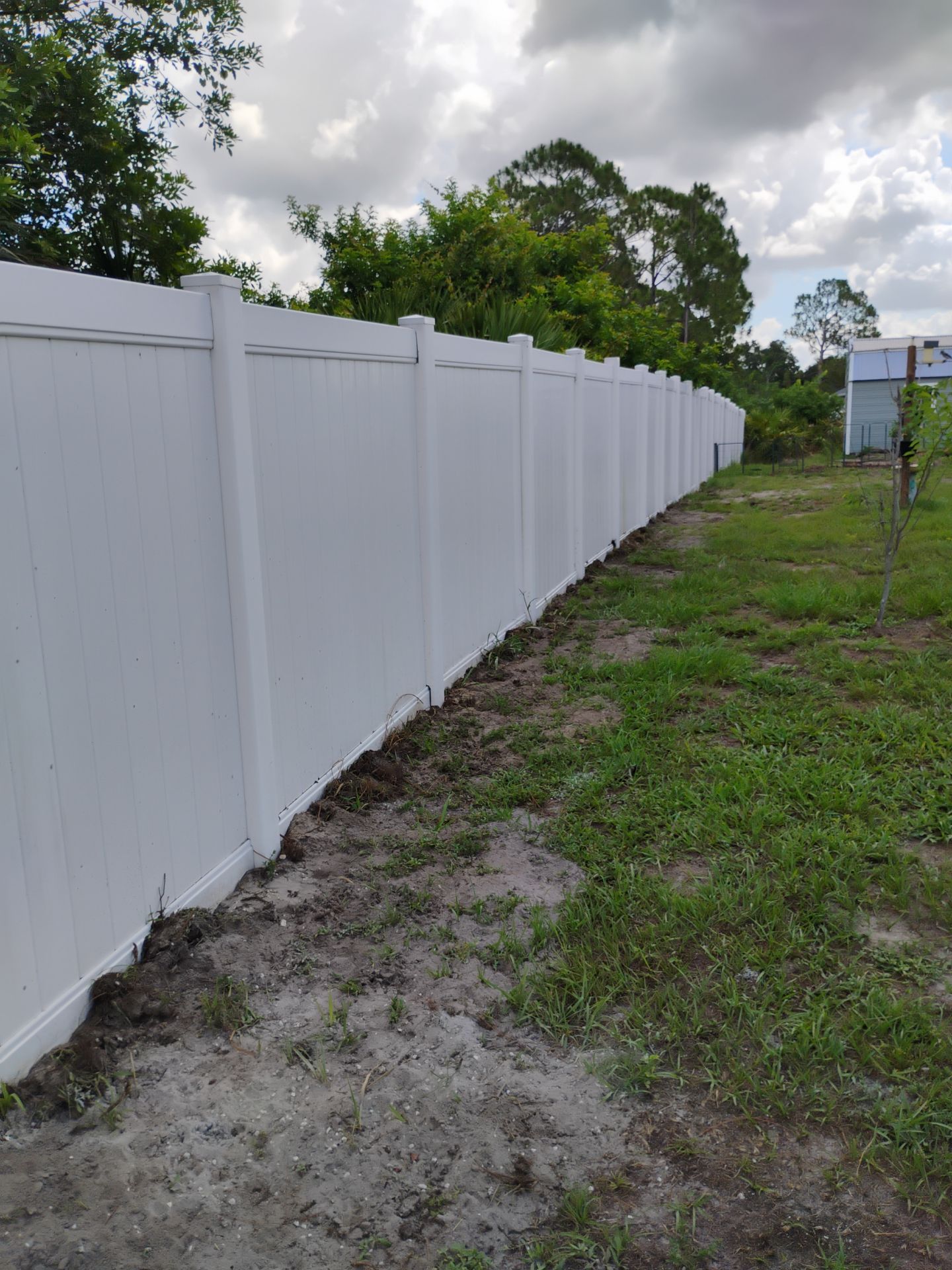 Black Chain Link and Vinyl Privacy Fence Installation in North Port by True Fence LLC