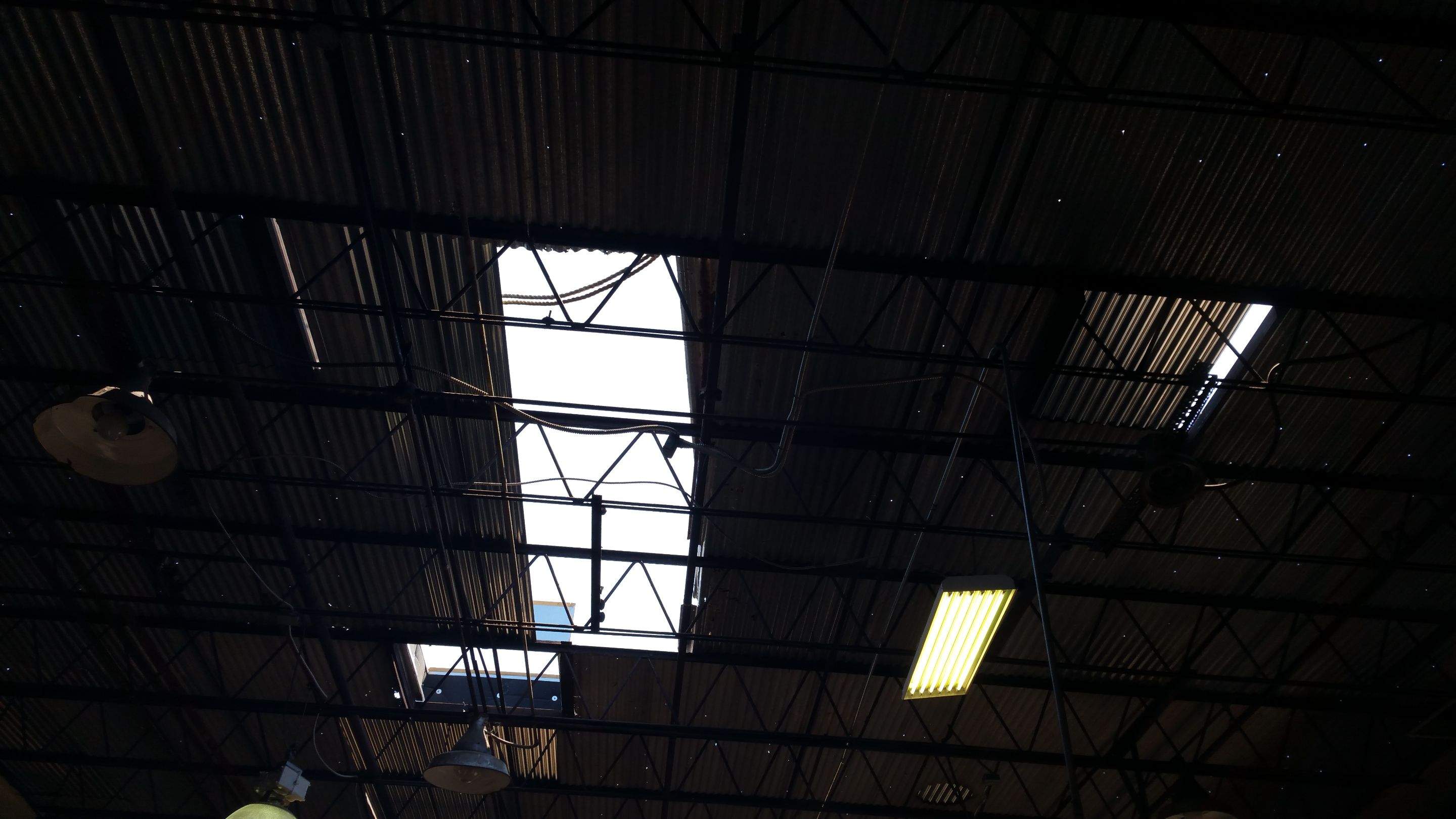 Massive Storm Damage Project - Factory in Arlington by First United Roofing & Construction