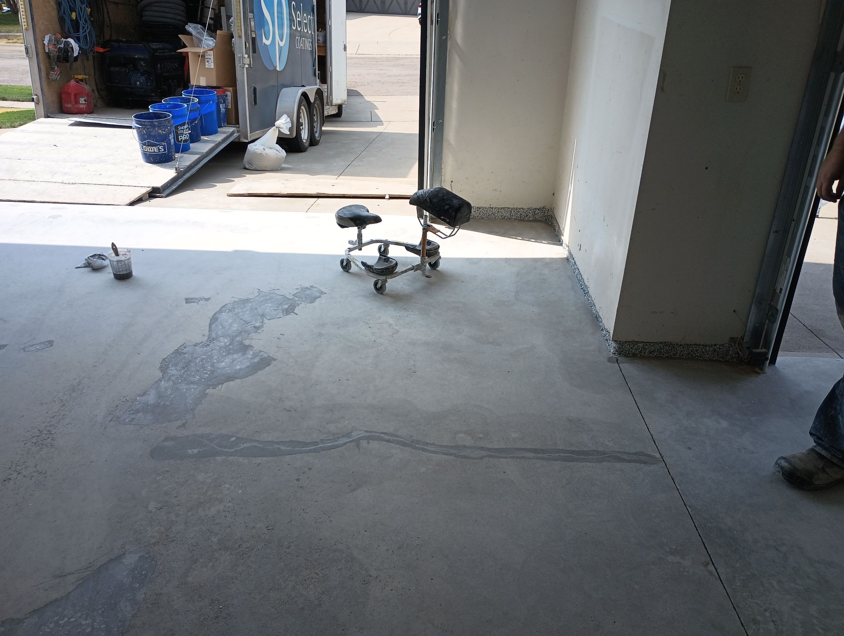 Garage Concrete Coating Installation in Sioux Falls Using Tidal Wave Finish by Select Painting, Coatings & Garage Cabinets