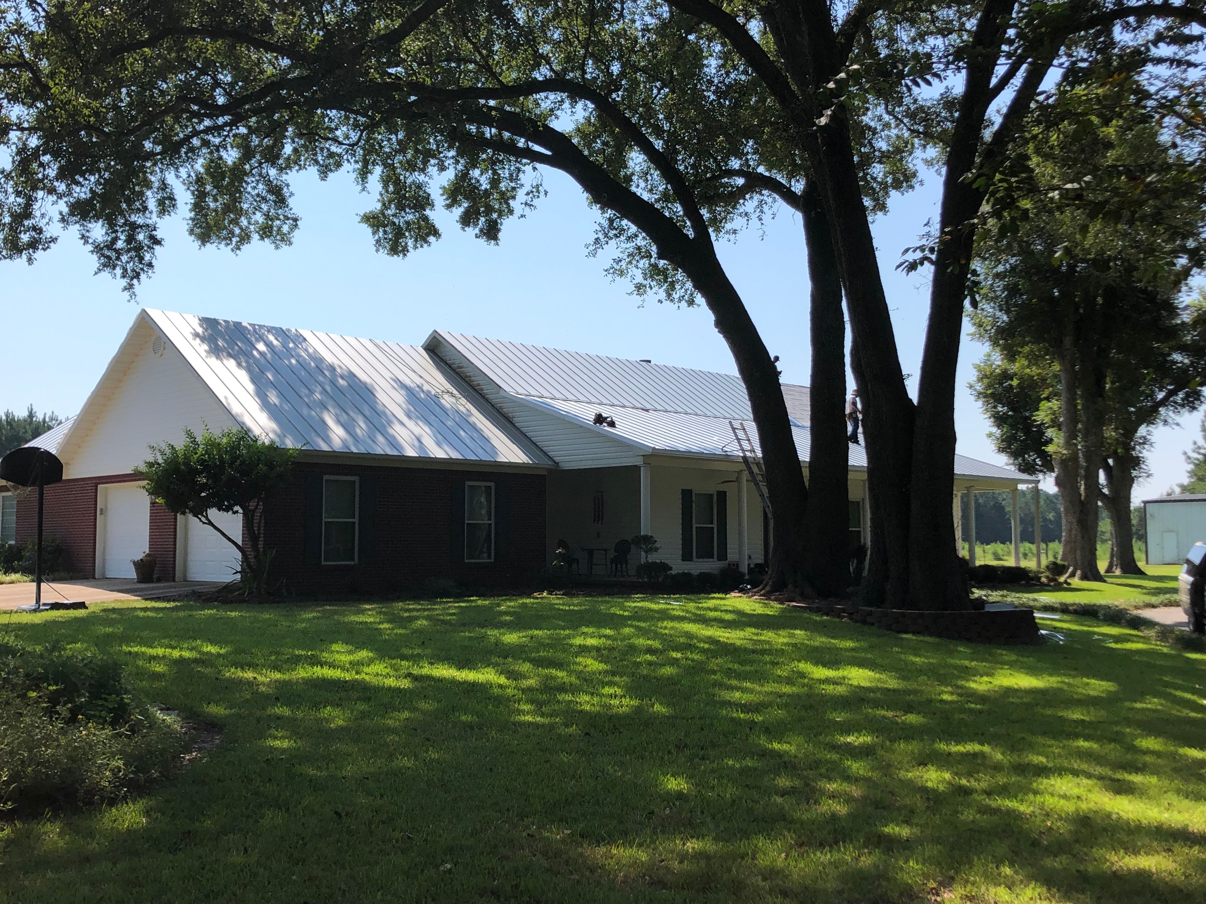 Residential Roofing Installation using Metal roofing by American Roofing & Construction LLC