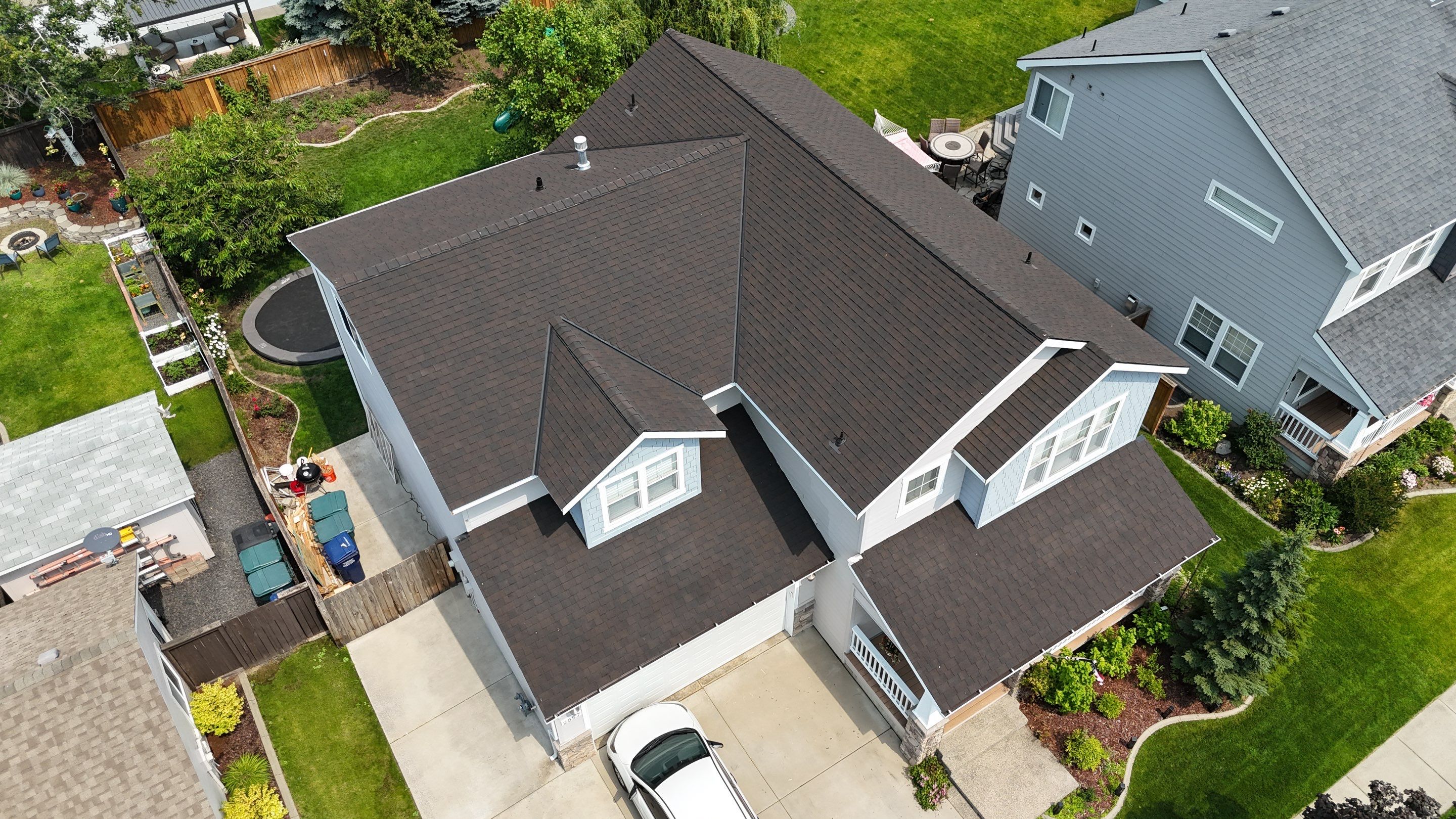 Alpine Roofing Enhances Marceille Court Homes in Coeur d'Alene, Idaho with CertainTeed Landmark TL Shingles - Max Def Black Walnut by Alpine Roofing