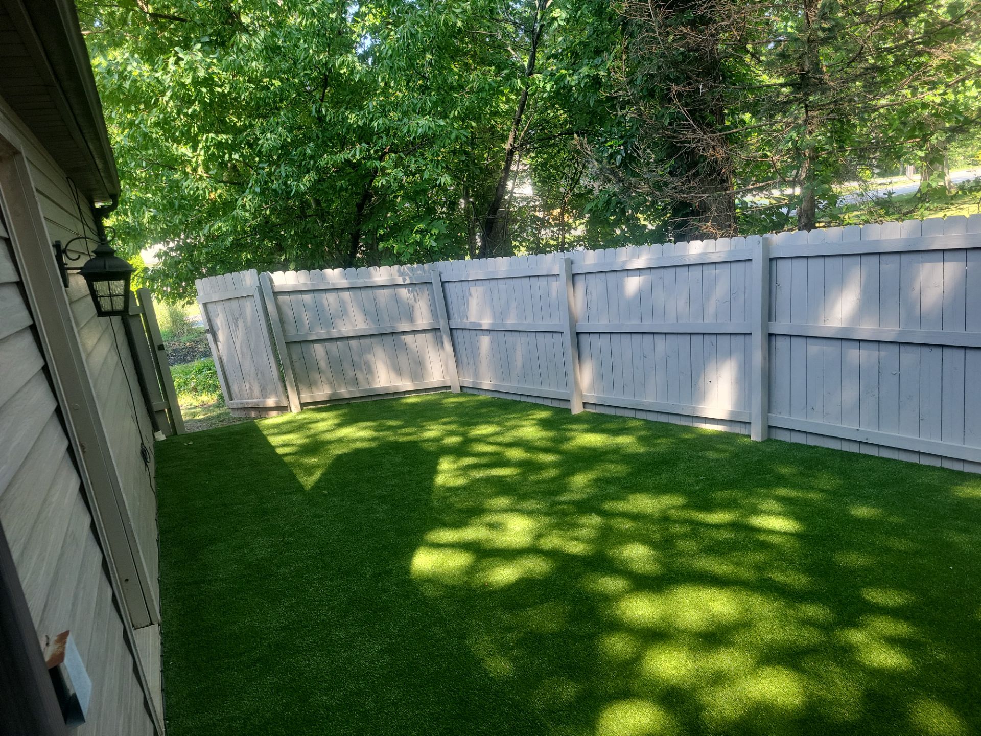 Synthetic Turf Installation for a Residential Backyard in Westlake by Southwest Greens Midwest