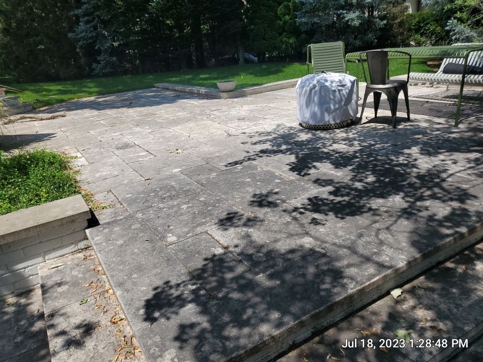 marble patio cleaning and sanding using Polysweep polymeric sand by Northern Power Washing LLC.