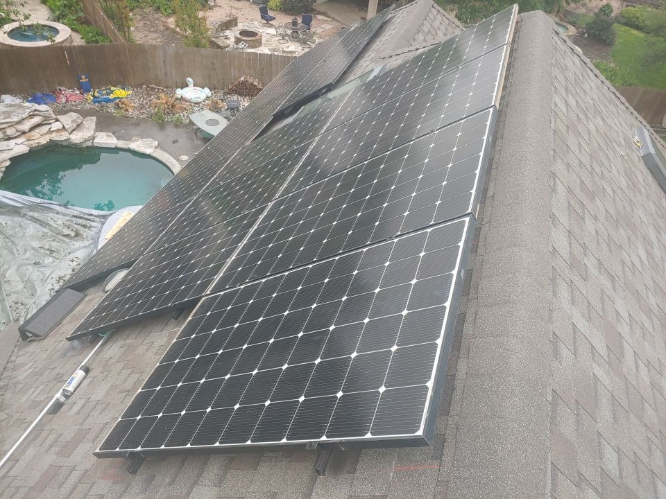 Residential Roof Replacement and Solar Panel Integration in Austin by Caliber Restoration LLC