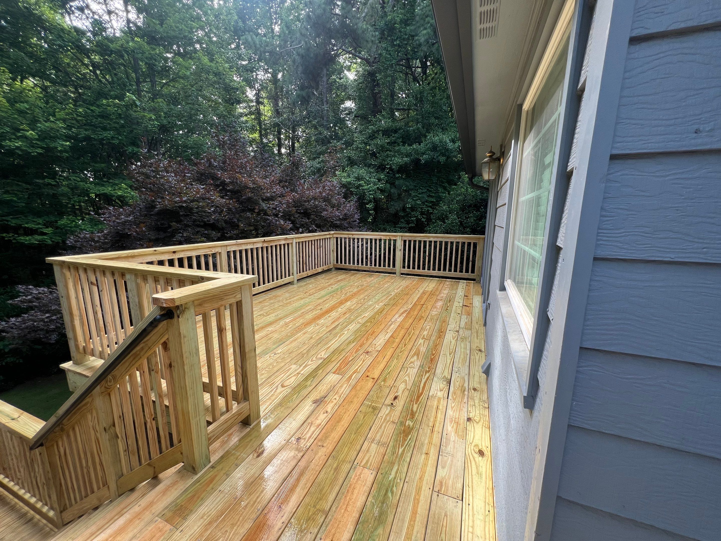 Pressure-Treated Wood Deck Replacement and Staircase Installation in Kennesaw by Swift Home Renovations