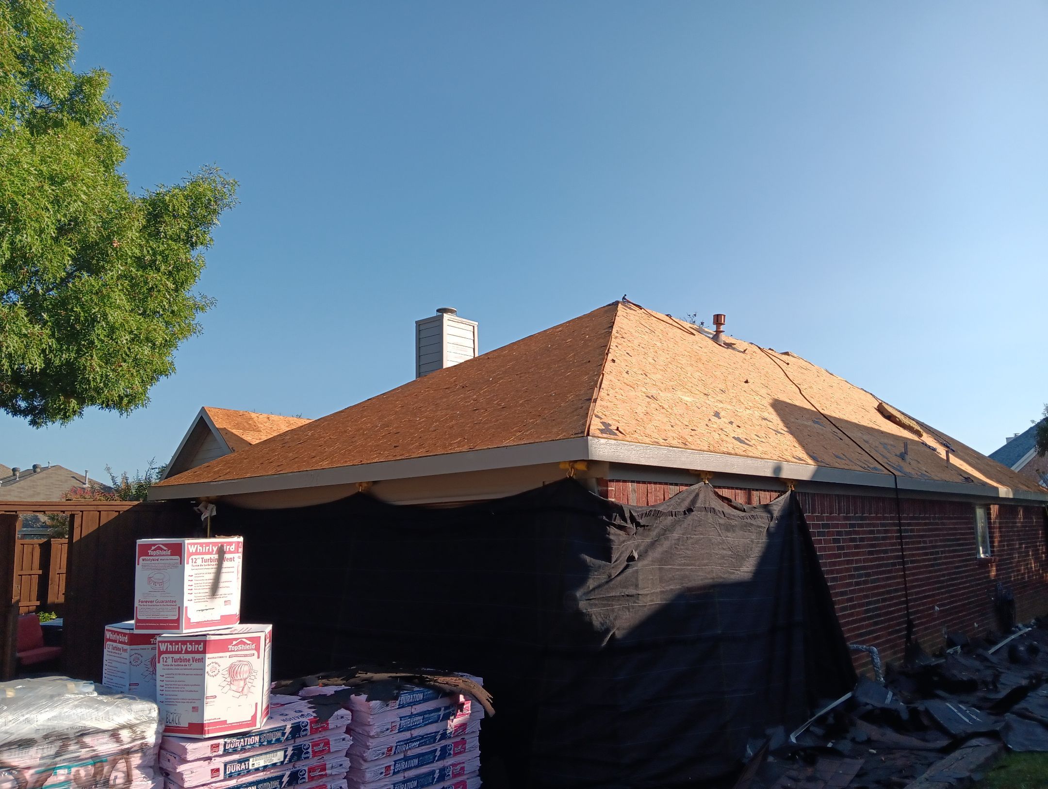 Exterior Makeover Reroof, Gutters and Exterior Paint by Tex-Line Roofing