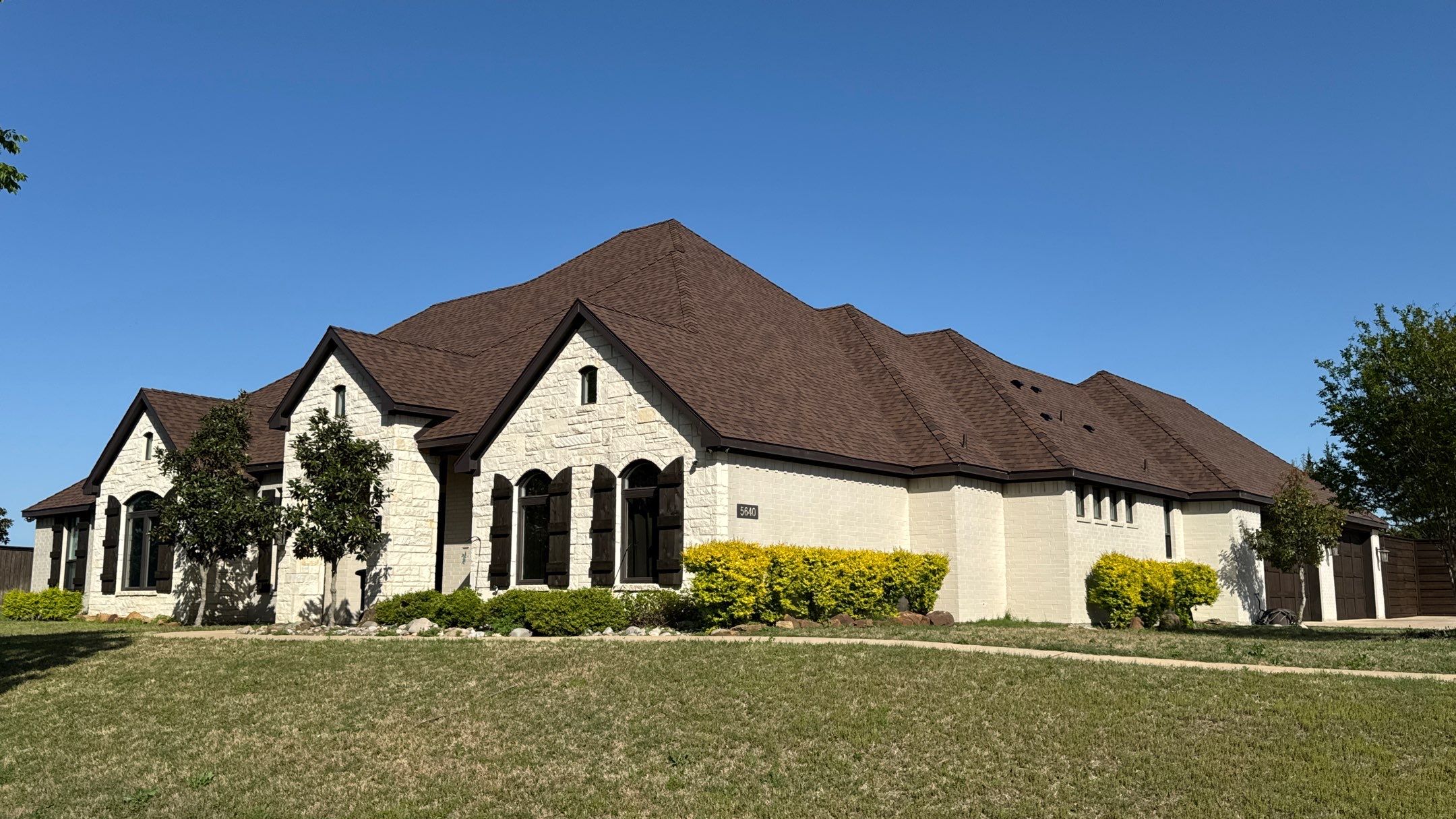 Residential Roofing Installation using CertainTeed Landmark ClimateFlex Shingles by Harvey Roofing & Construction