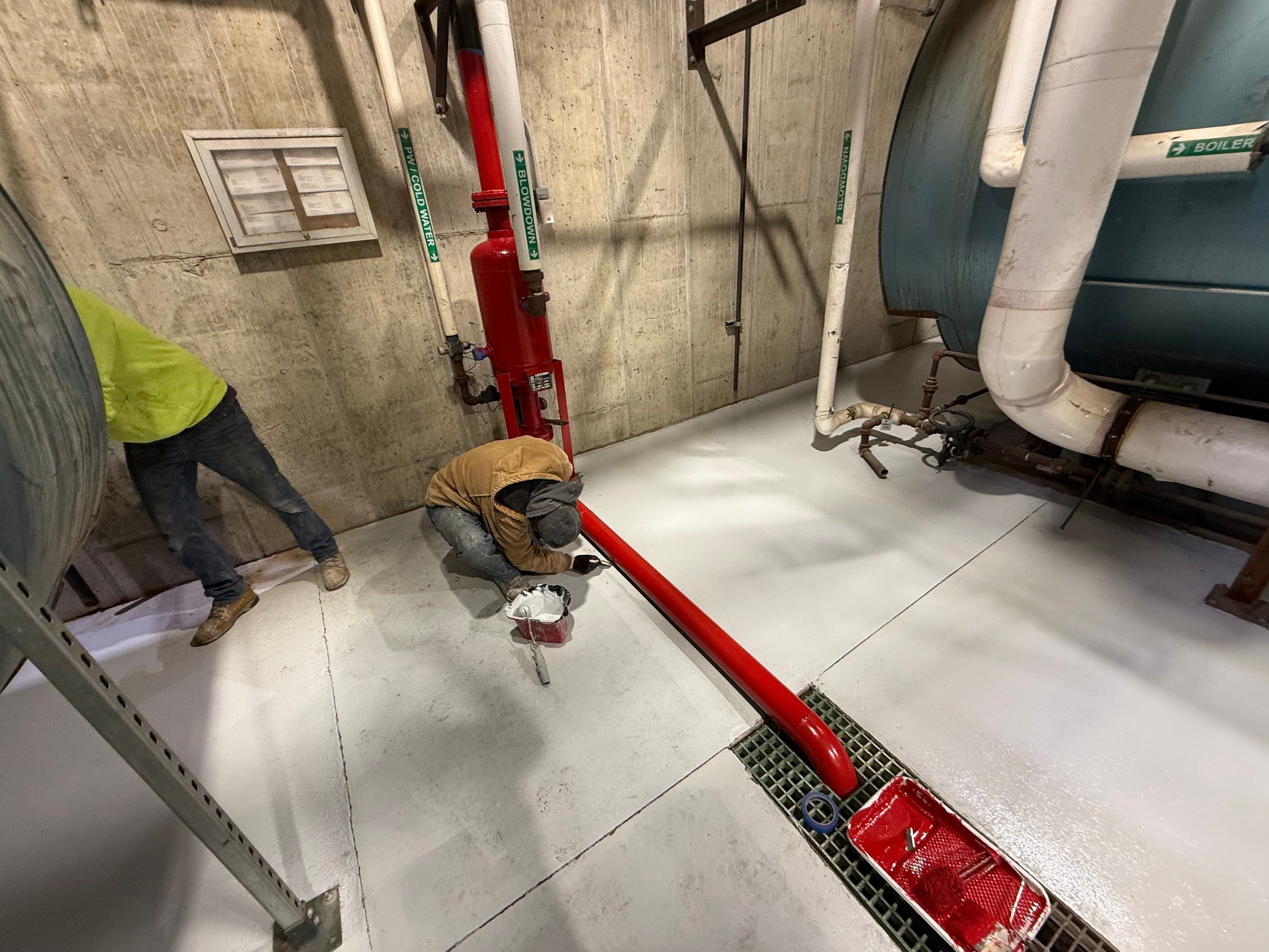 Industrial Epoxy Floor Coating for Perdue Premium Meat Co in Sioux Center by Select Painting, Coatings & Garage Cabinets