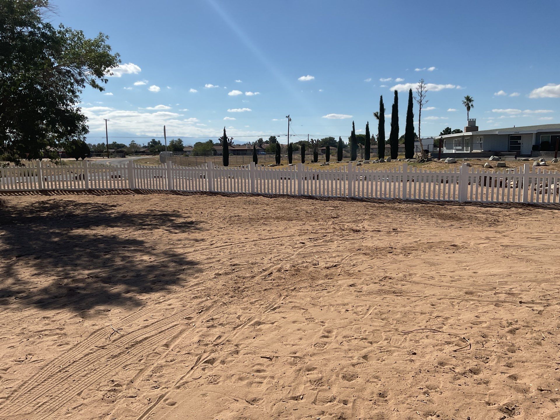 White picket fence  by Fence Guys Inc. 