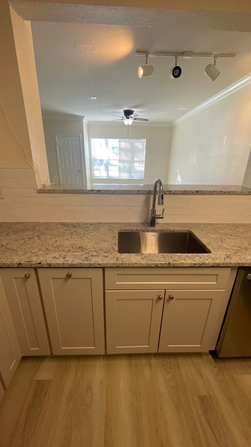 Home Remodel using LVP Flooring and Cabinets by HandyMangum